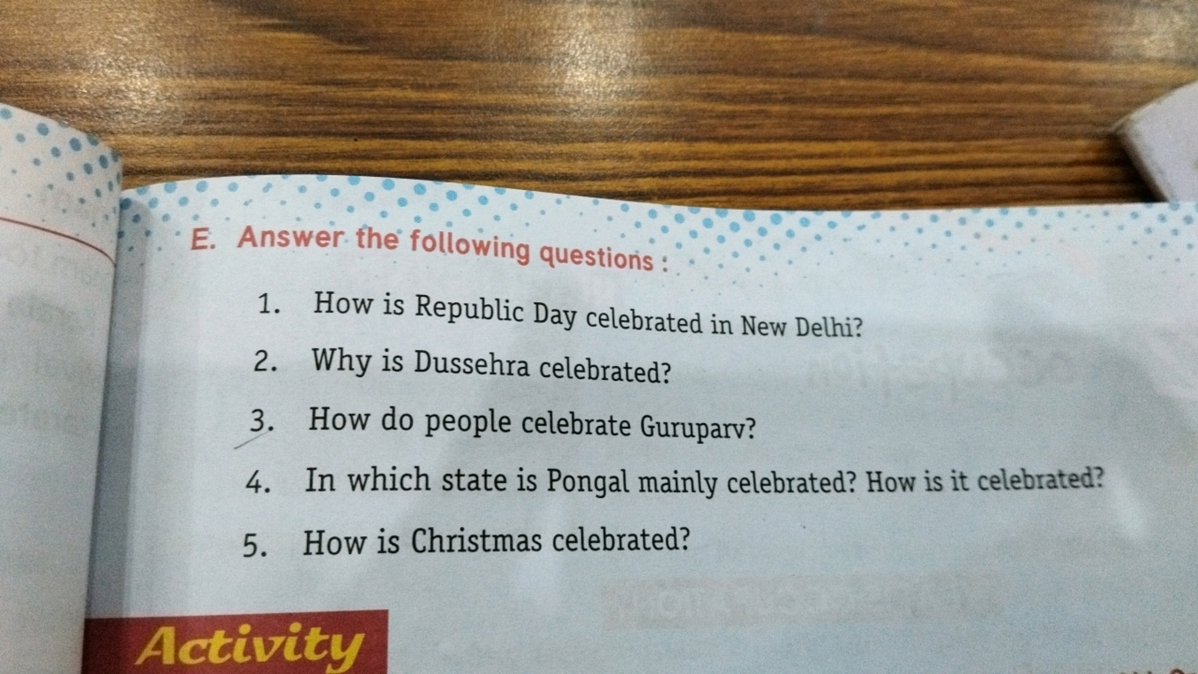 E. Answer the following questions:
1. How is Republic Day celebrated i