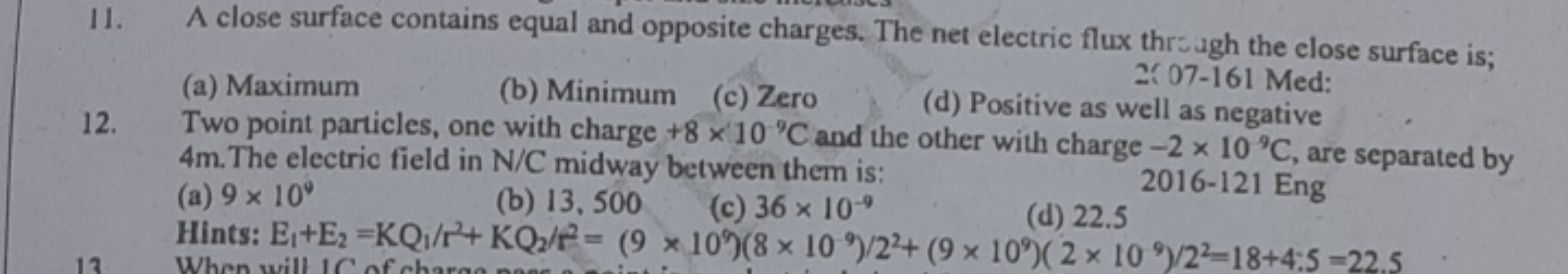 11. A close surface contains equal and opposite charges. The net elect