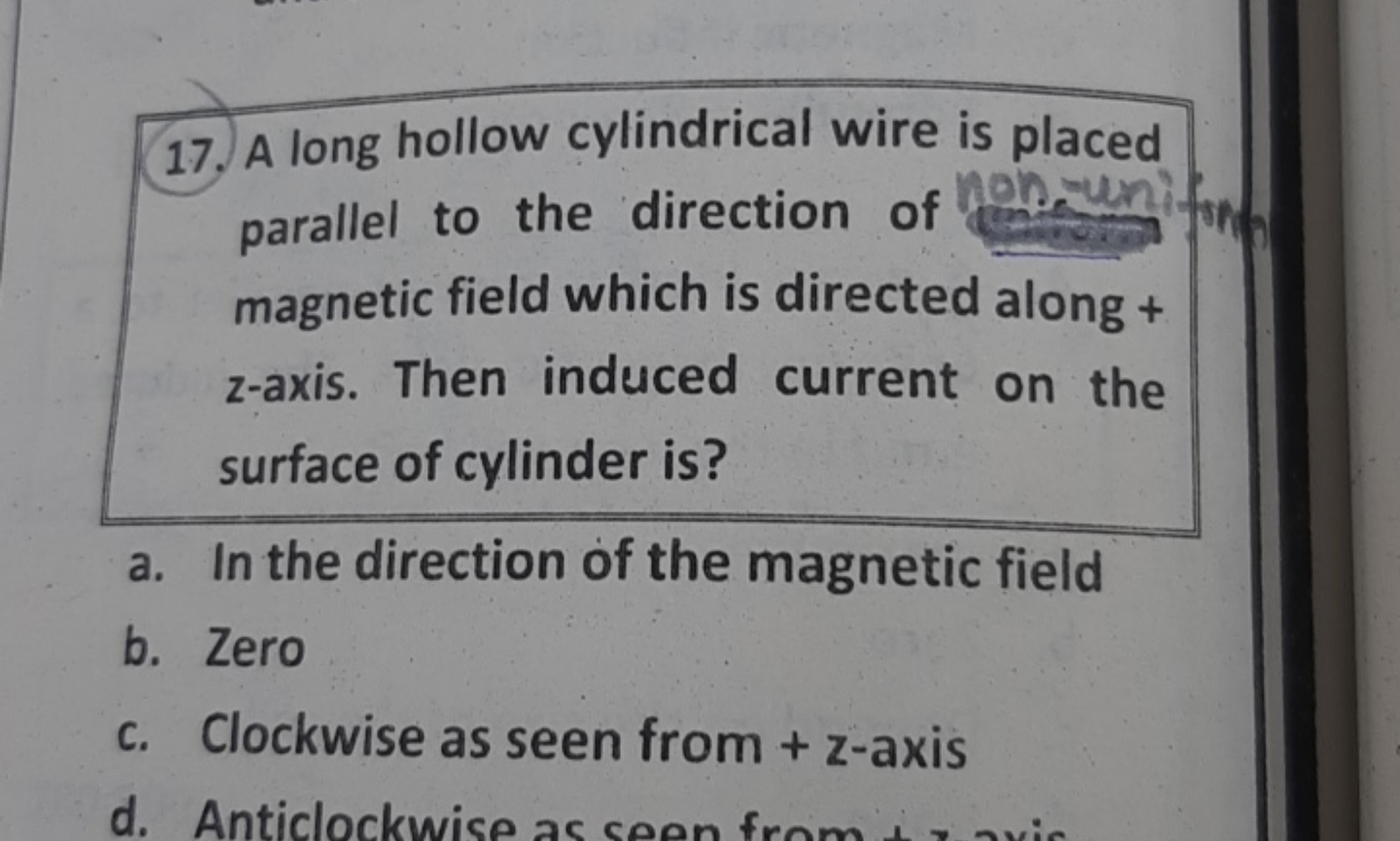 17. A long hollow cylindrical wire is placed parallel to the direction