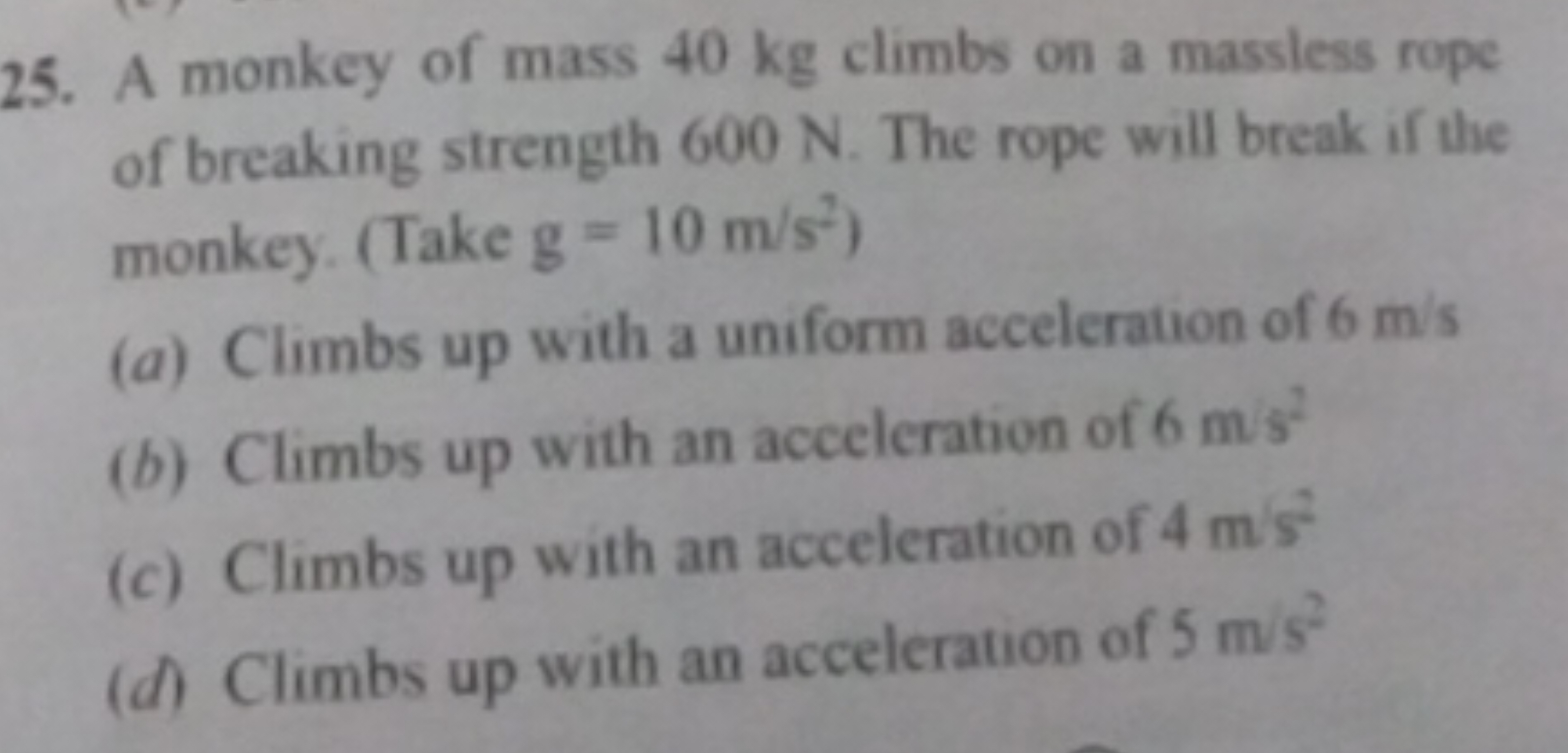 25. A monkey of mass 40 kg climbs on a massless rope of breaking stren