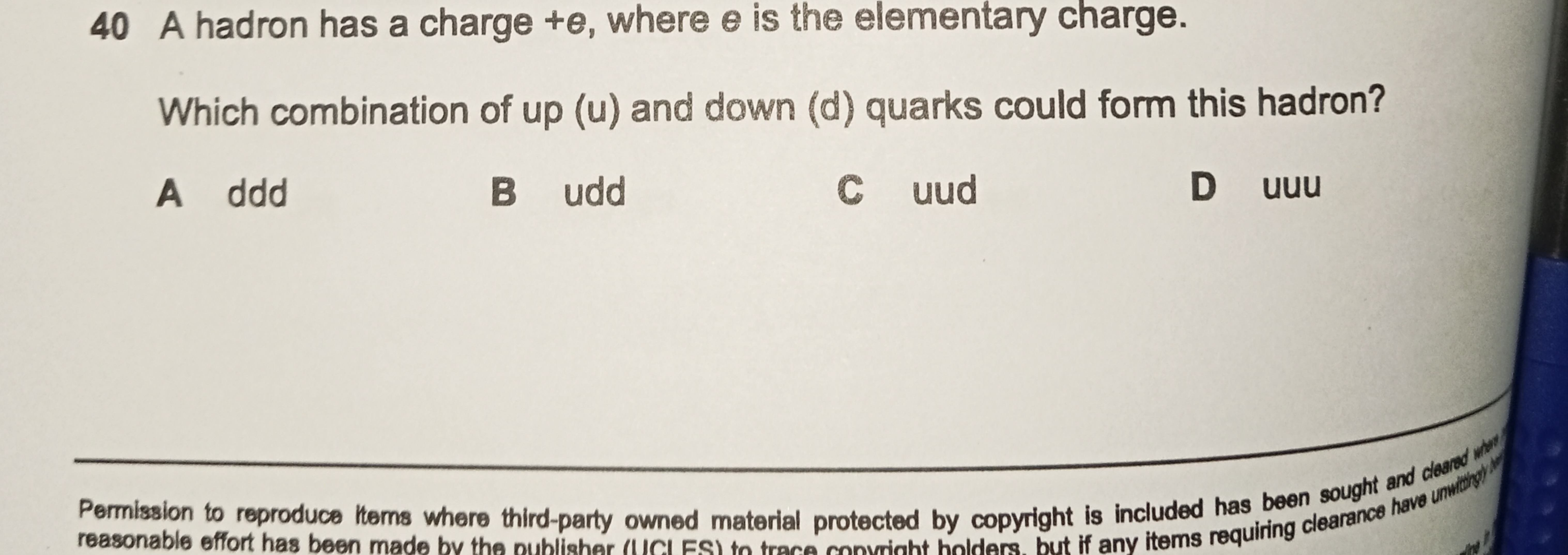 40 A hadron has a charge +e, where e is the elementary charge.
Which c