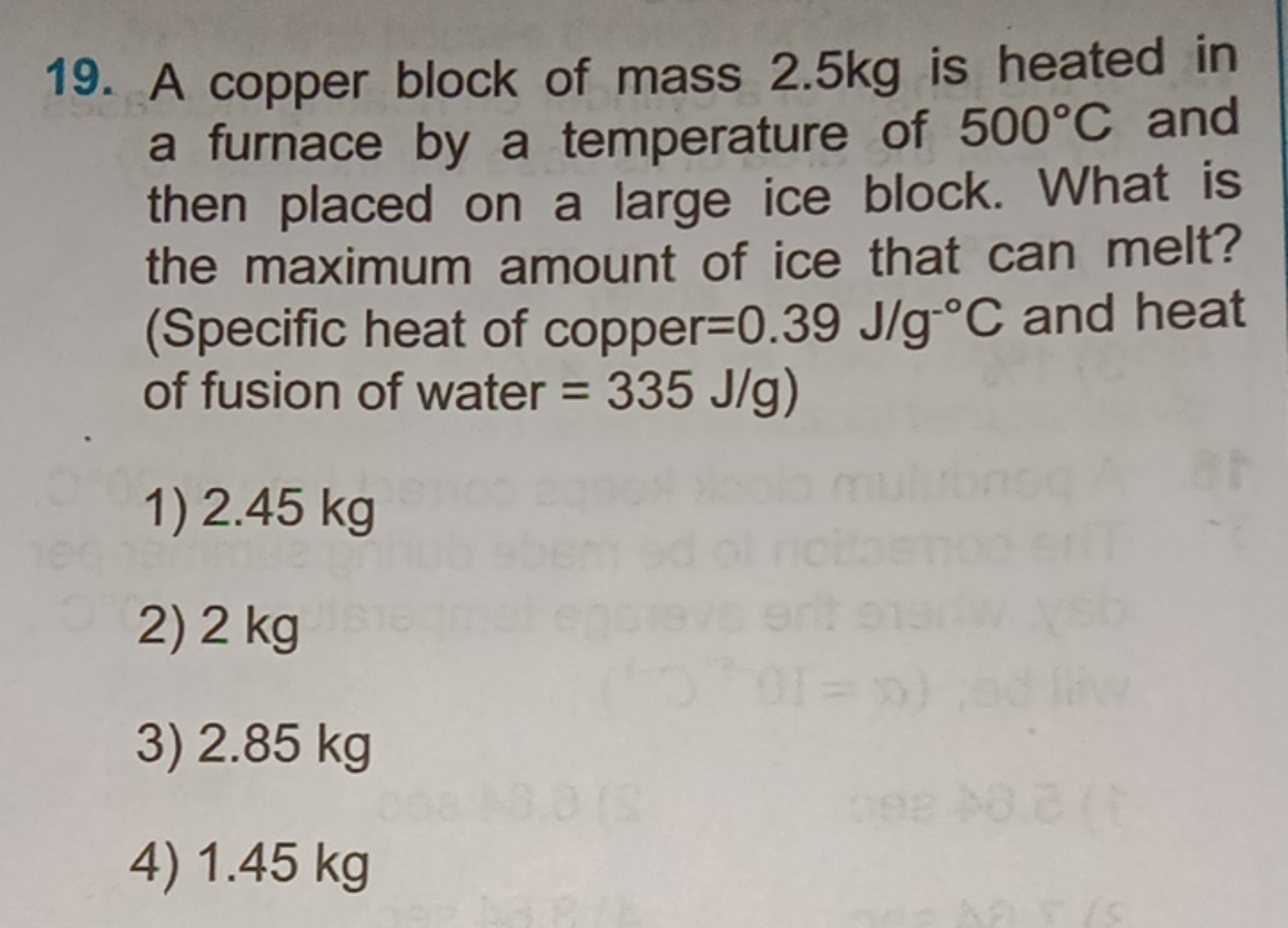 19. A copper block of mass 2.5 kg is heated in a furnace by a temperat