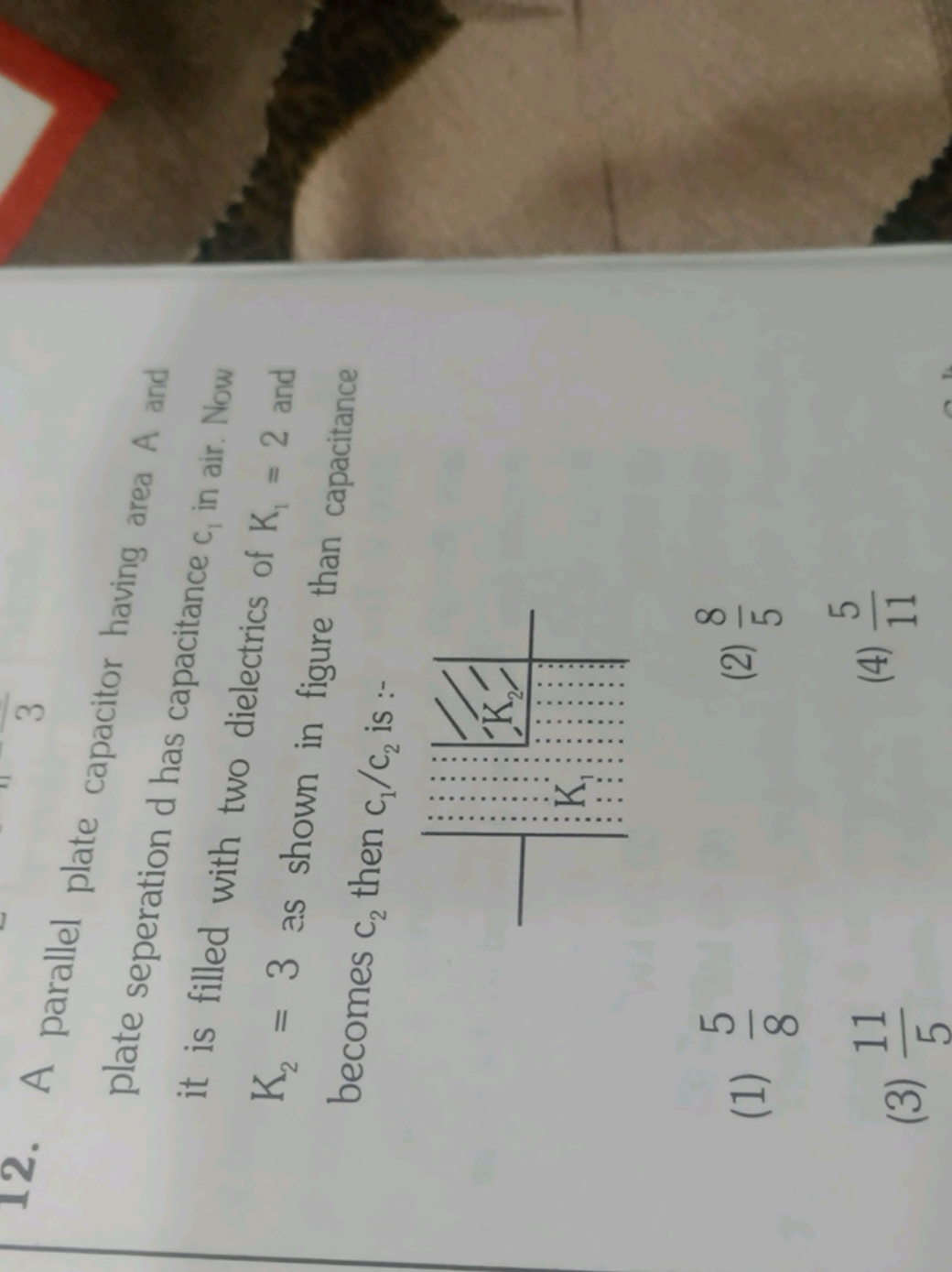 12. A parallel plate capacitor having area A and plate seperation d ha