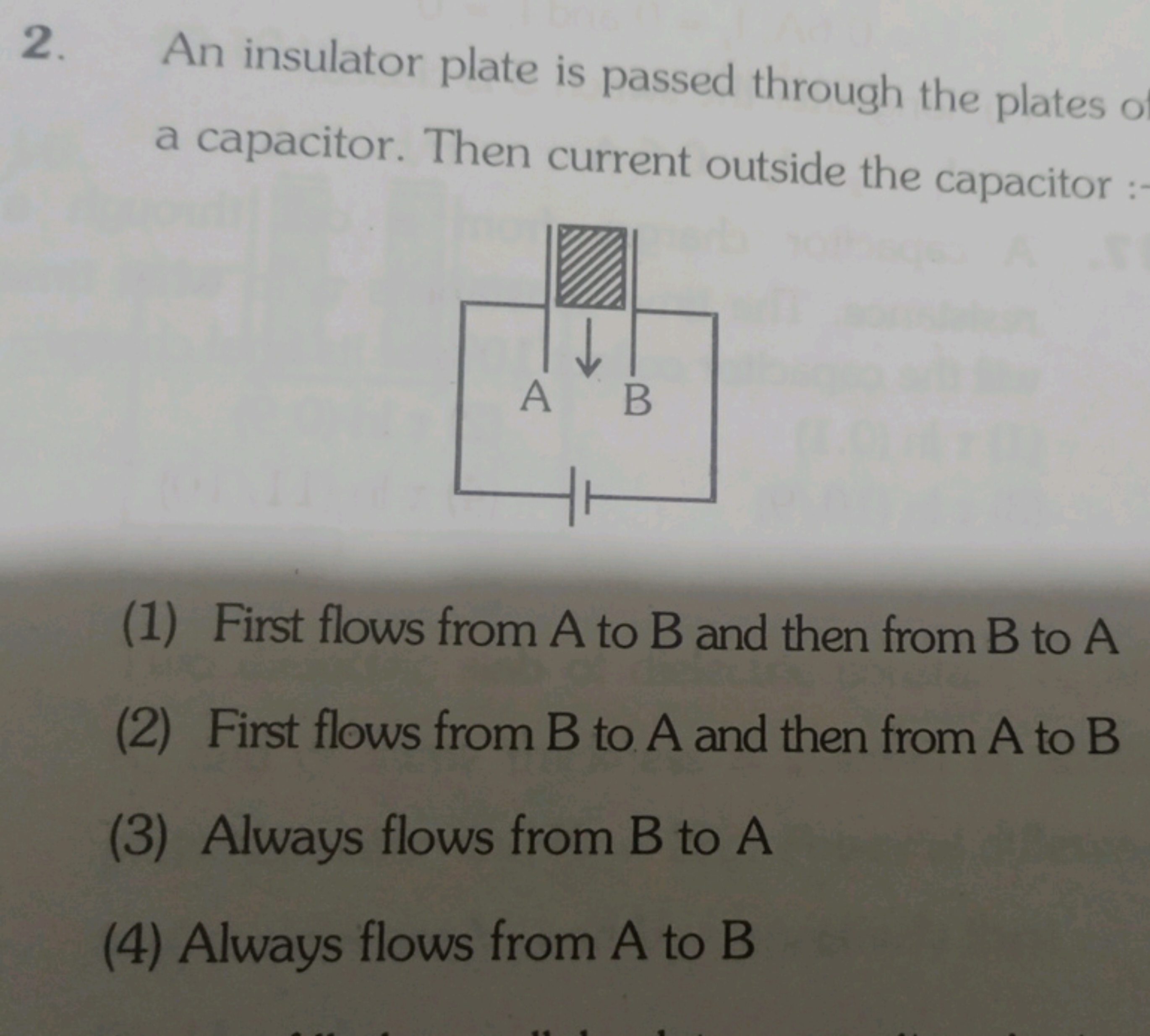 2. An insulator plate is passed through the plates a capacitor. Then c