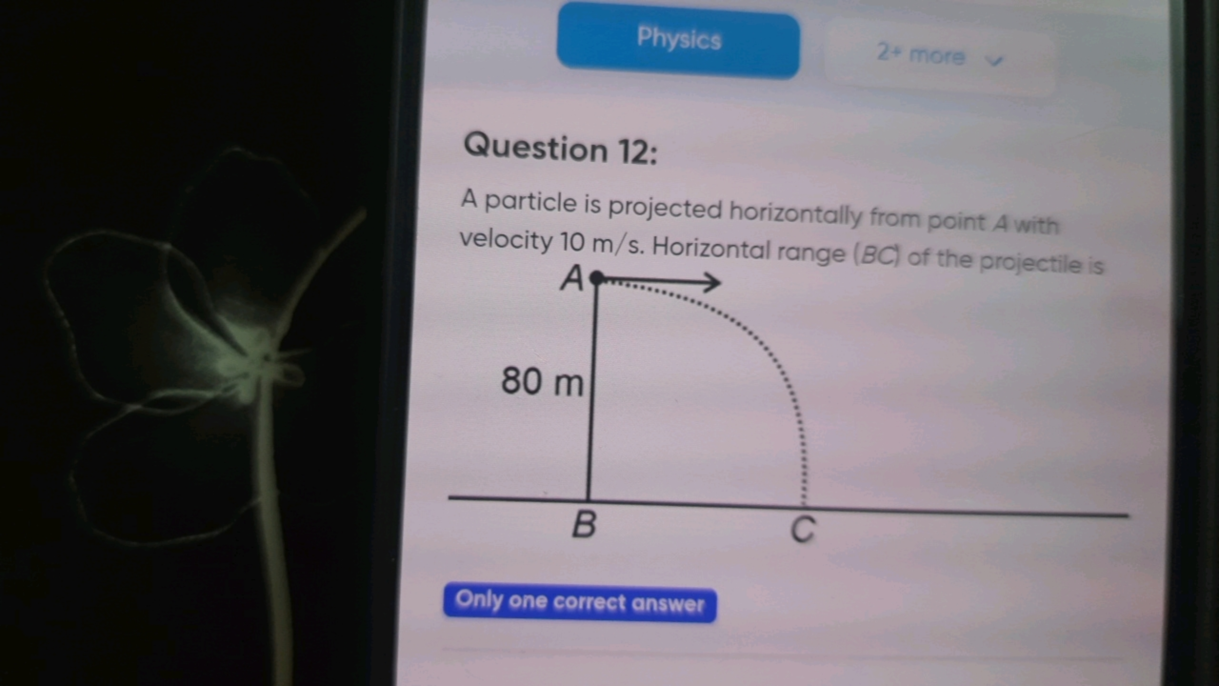 Physics
2+ more

Question 12:
A particle is projected horizontally fro