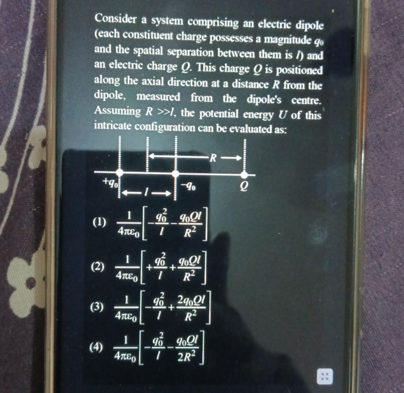 Consider a system comprising an electric dipole (each constituent char