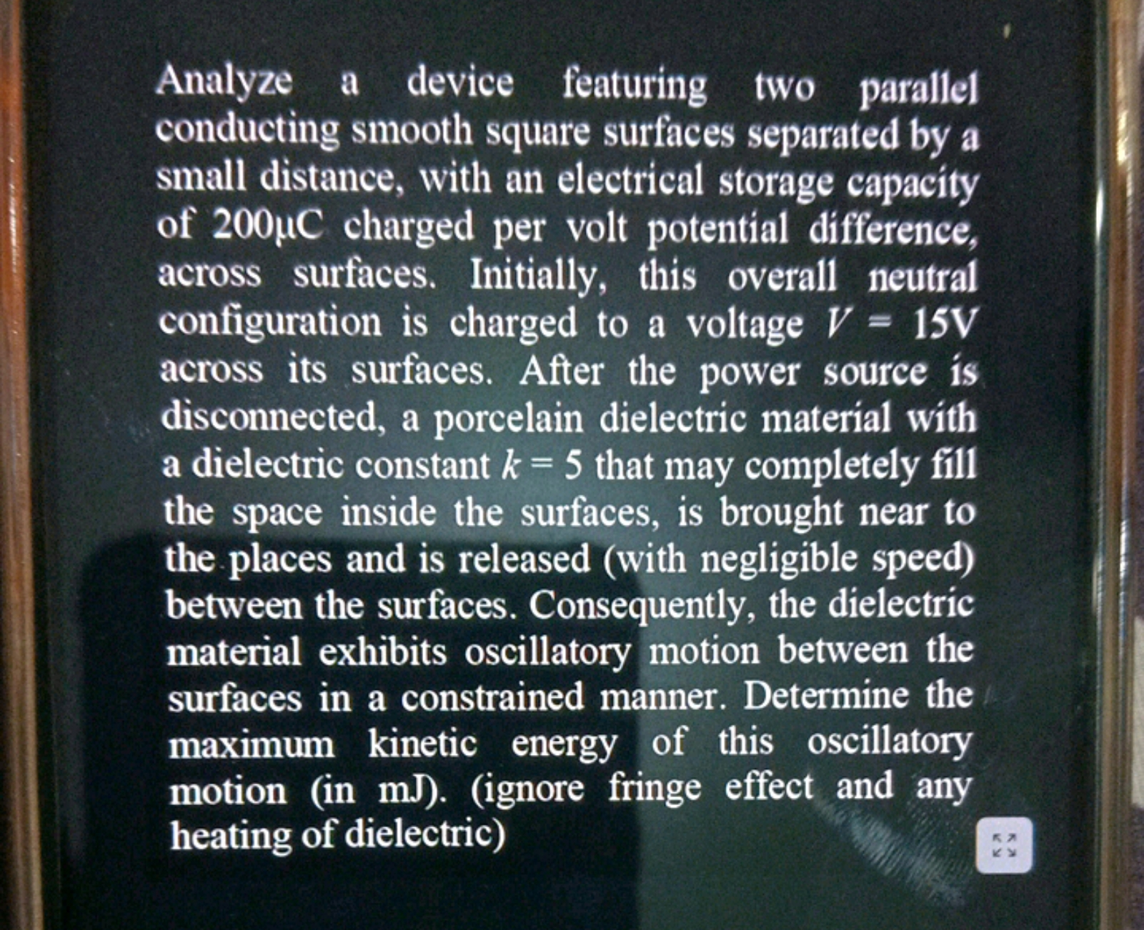 Analyze a device featuring two parallel conducting smooth square surfa