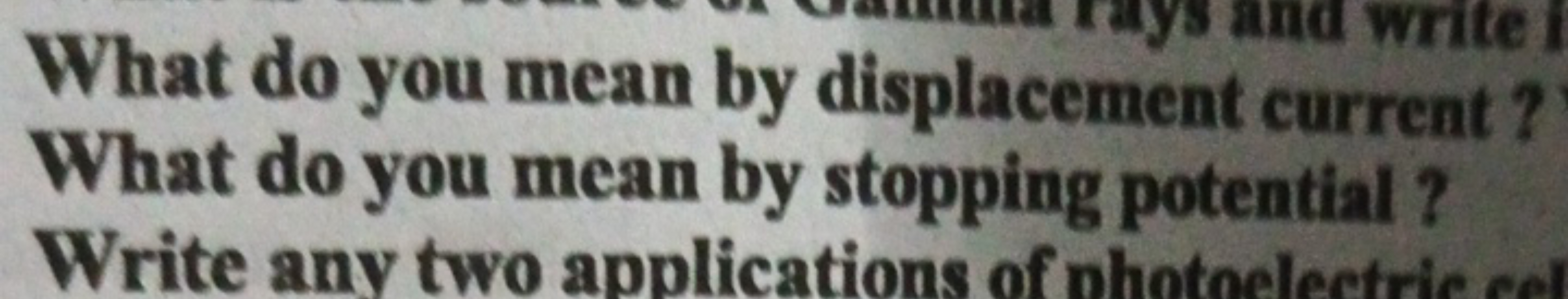 What do you mean by displacement current? What do you mean by stopping