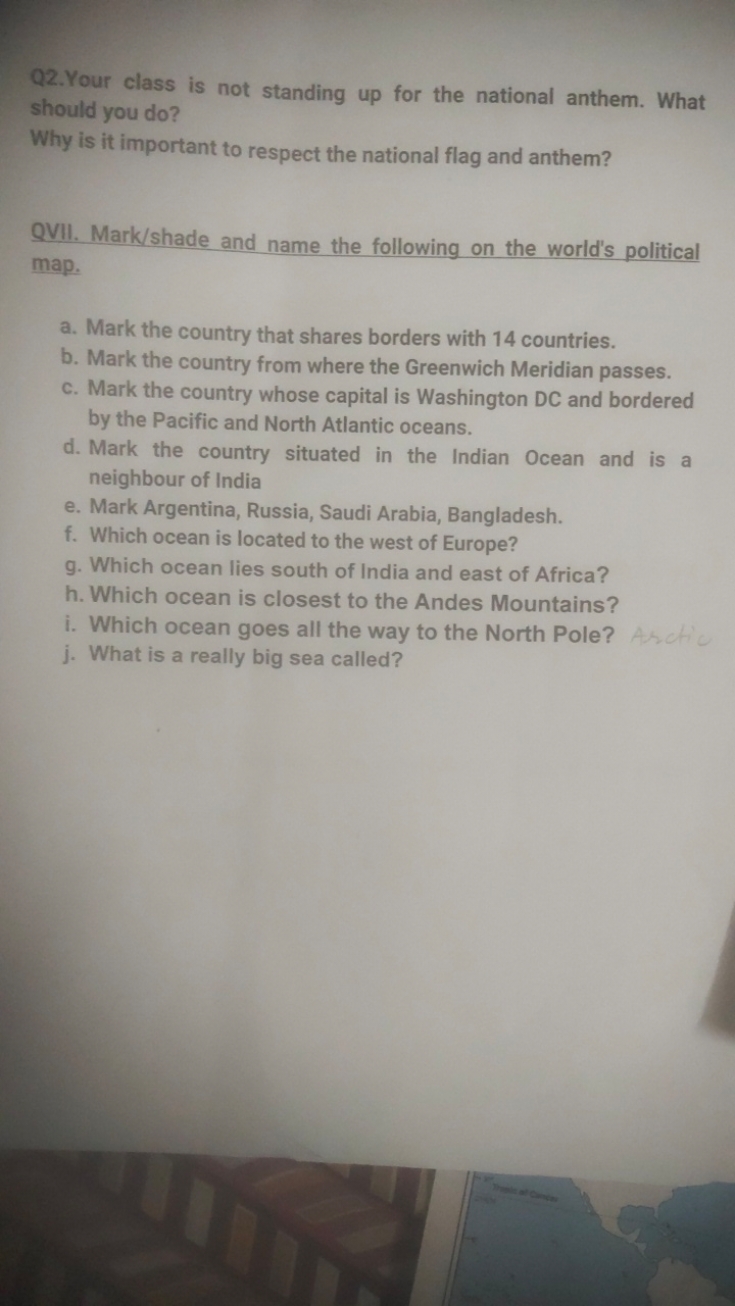 Q2.Your class is not standing up for the national anthem. What should 