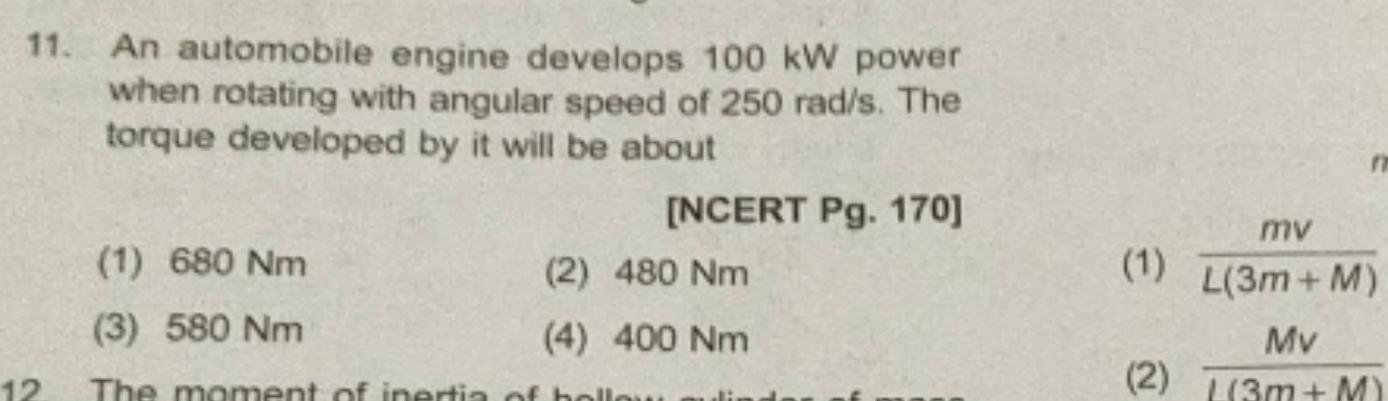 11. An automobile engine develops 100 kW power when rotating with angu