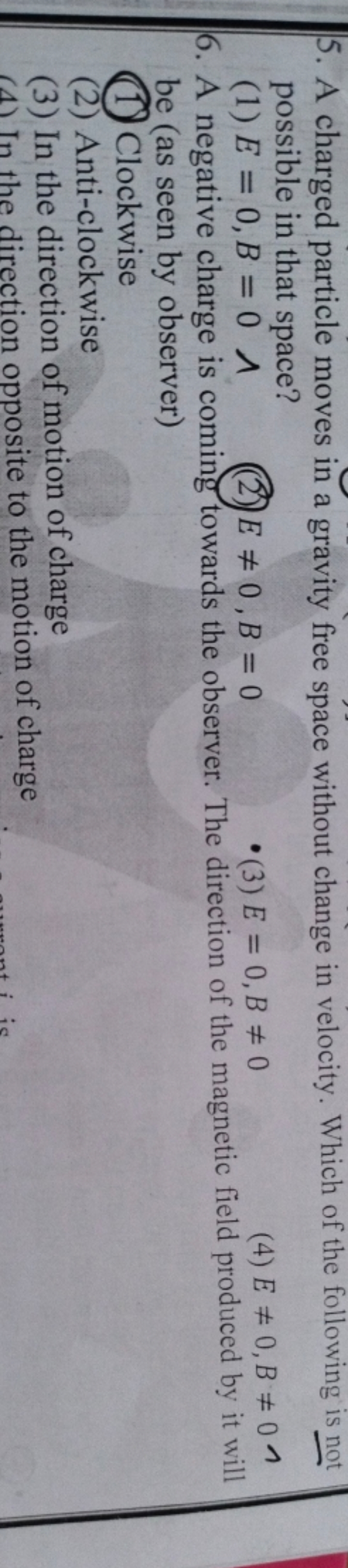 5. A charged particle moves in a gravity free space without change in 