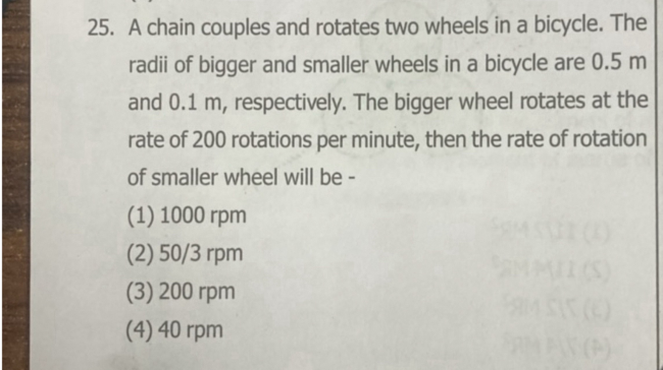 25. A chain couples and rotates two wheels in a bicycle. The radii of 