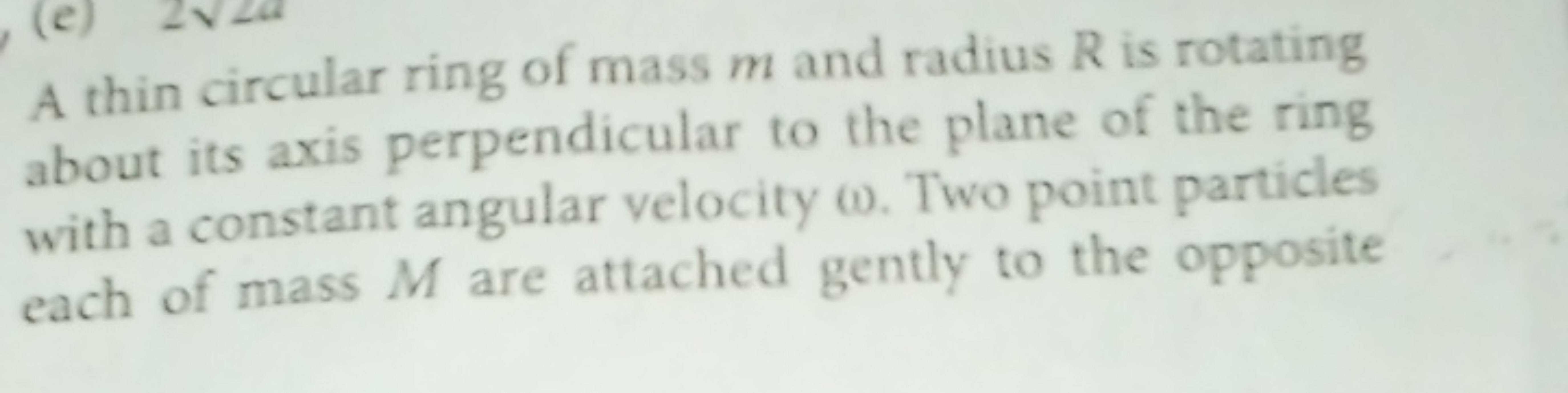 A thin circular ring of mass m and radius R is rotating about its axis