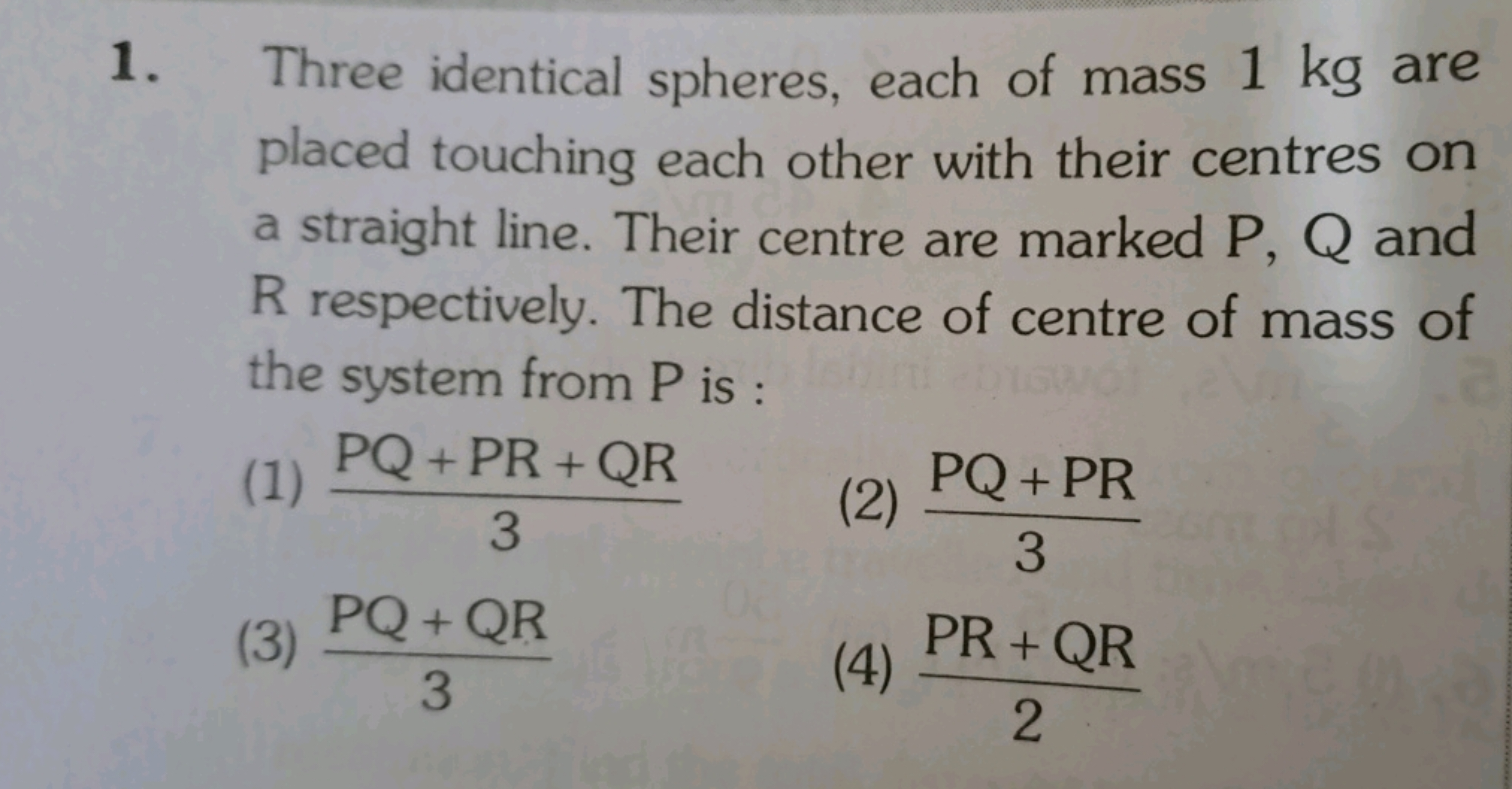 1. Three identical spheres, each of mass 1 kg are placed touching each