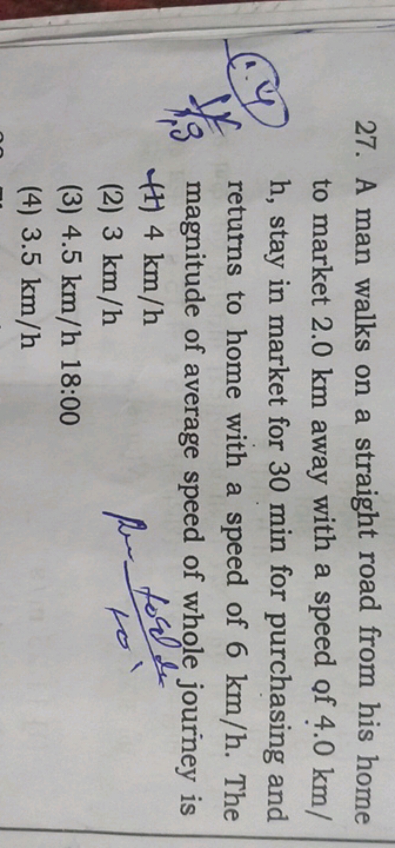 27. A man walks on a straight road from his home to market 2.0 km away