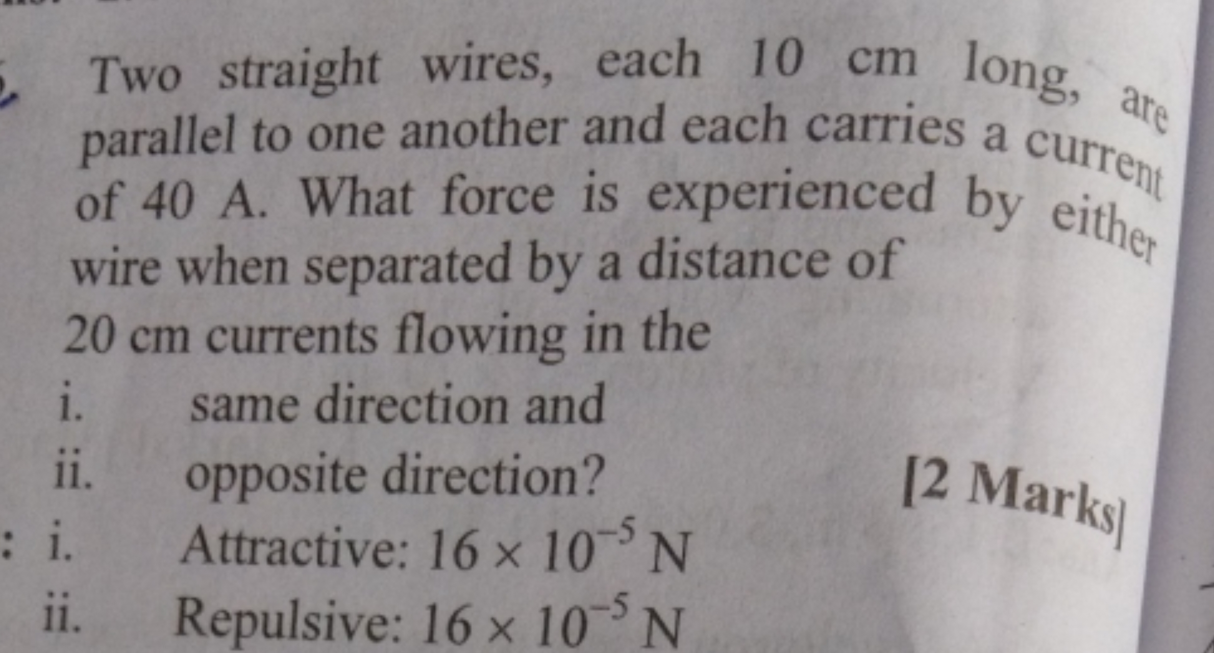 Two straight wires, each 10 cm long, are parallel to one another and e