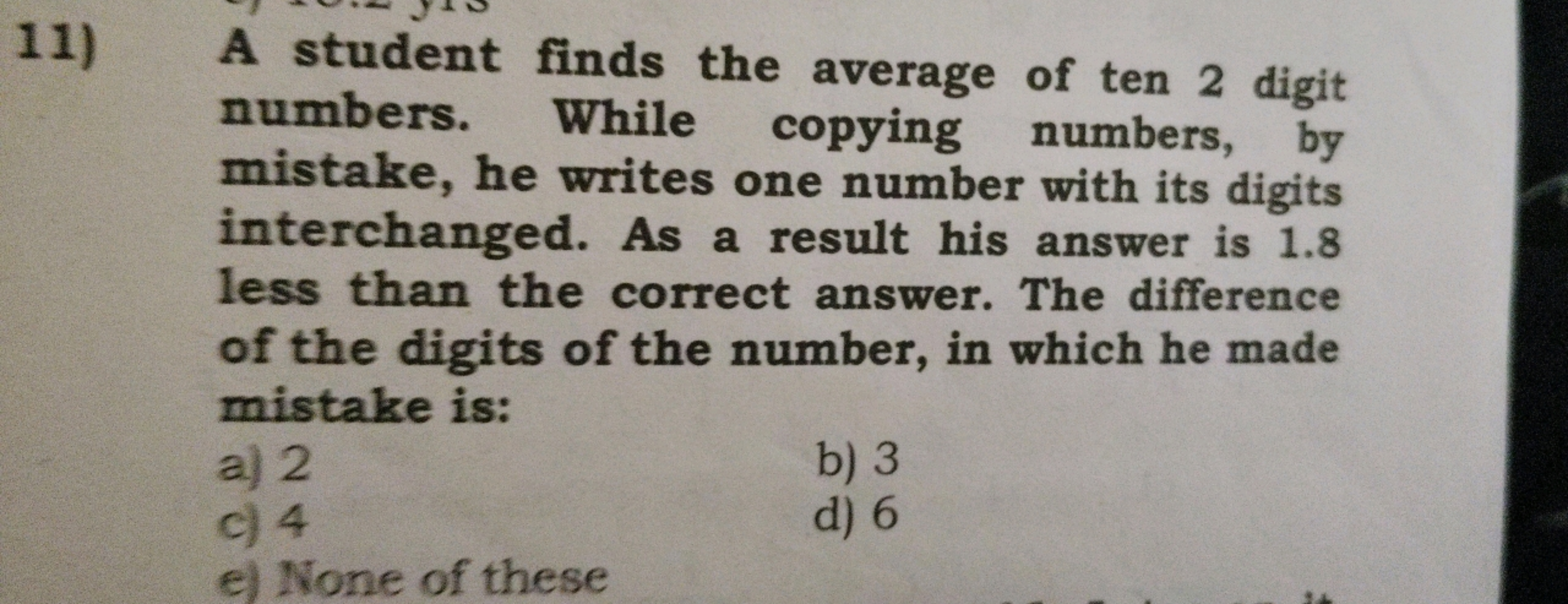 11) A student finds the average of ten 2 digit numbers. While copying 