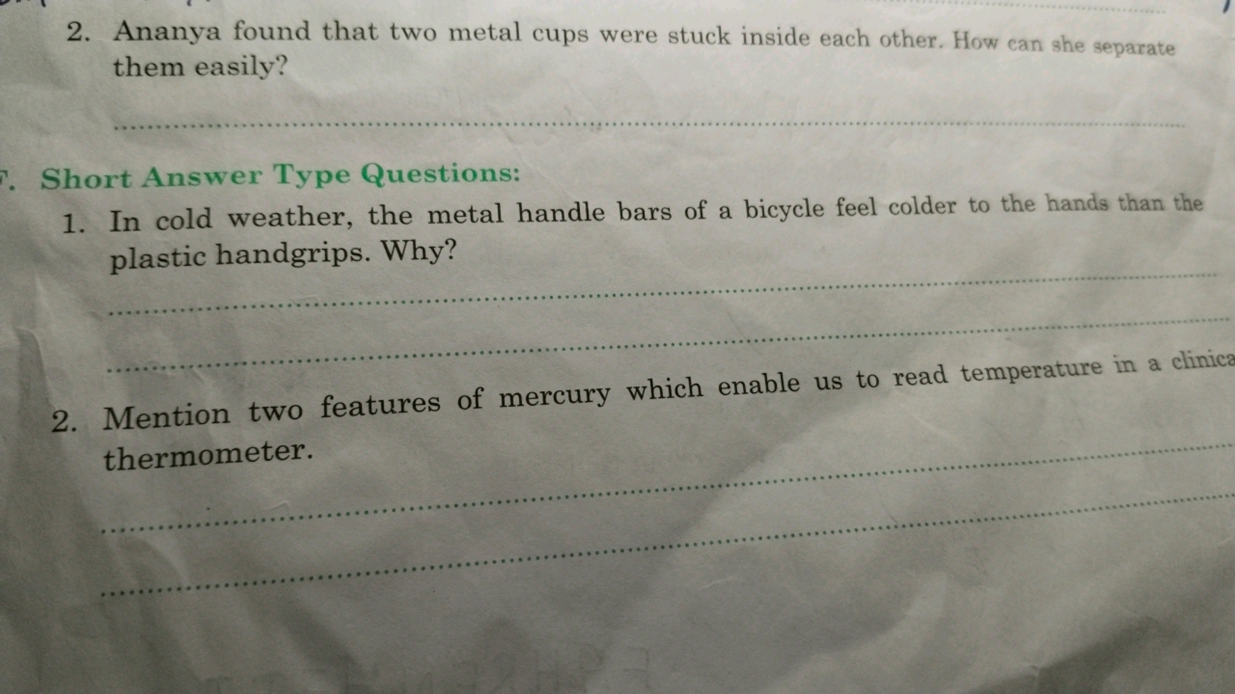 2. Ananya found that two metal cups were stuck inside each other. How 