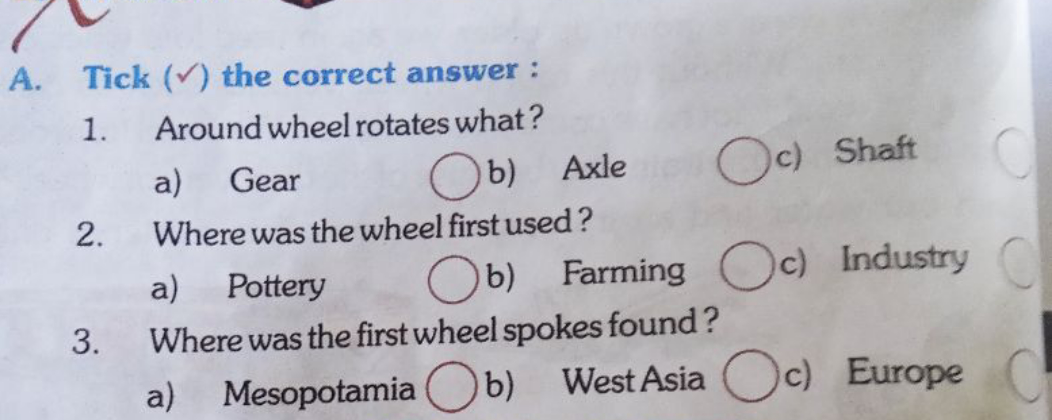 A. Tick (✓) the correct answer :
1. Around wheel rotates what?
a) Gear