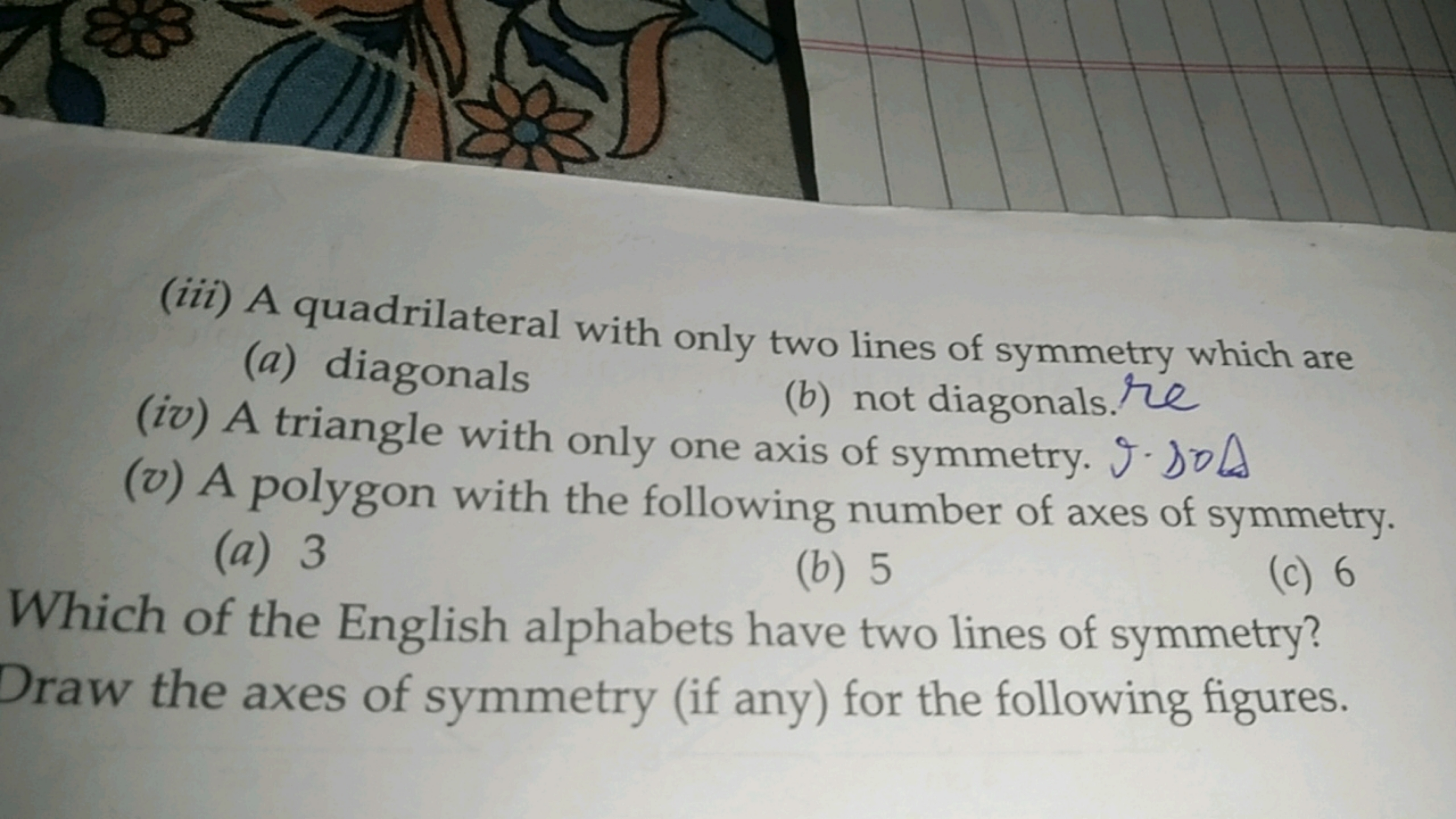 (iii) A quadrilateral with only two lines of symmetry which are
(a) di