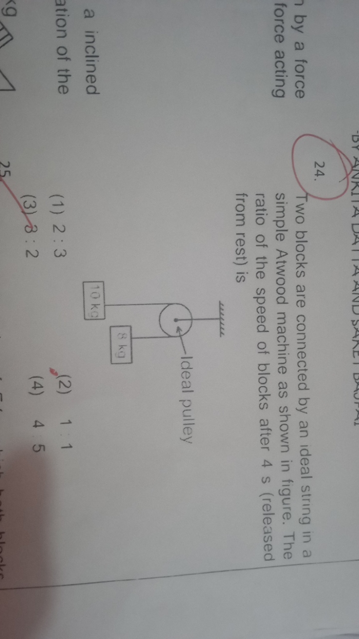 24. Two blocks are connected by an ideal string in a simple Atwood mac