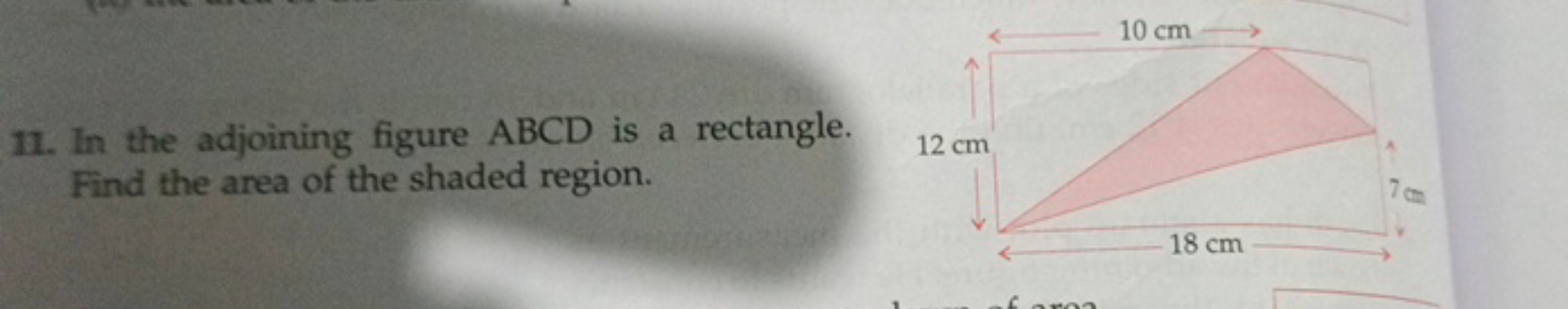 11. In the adjoining figure ABCD is a rectangle. Find the area of the 