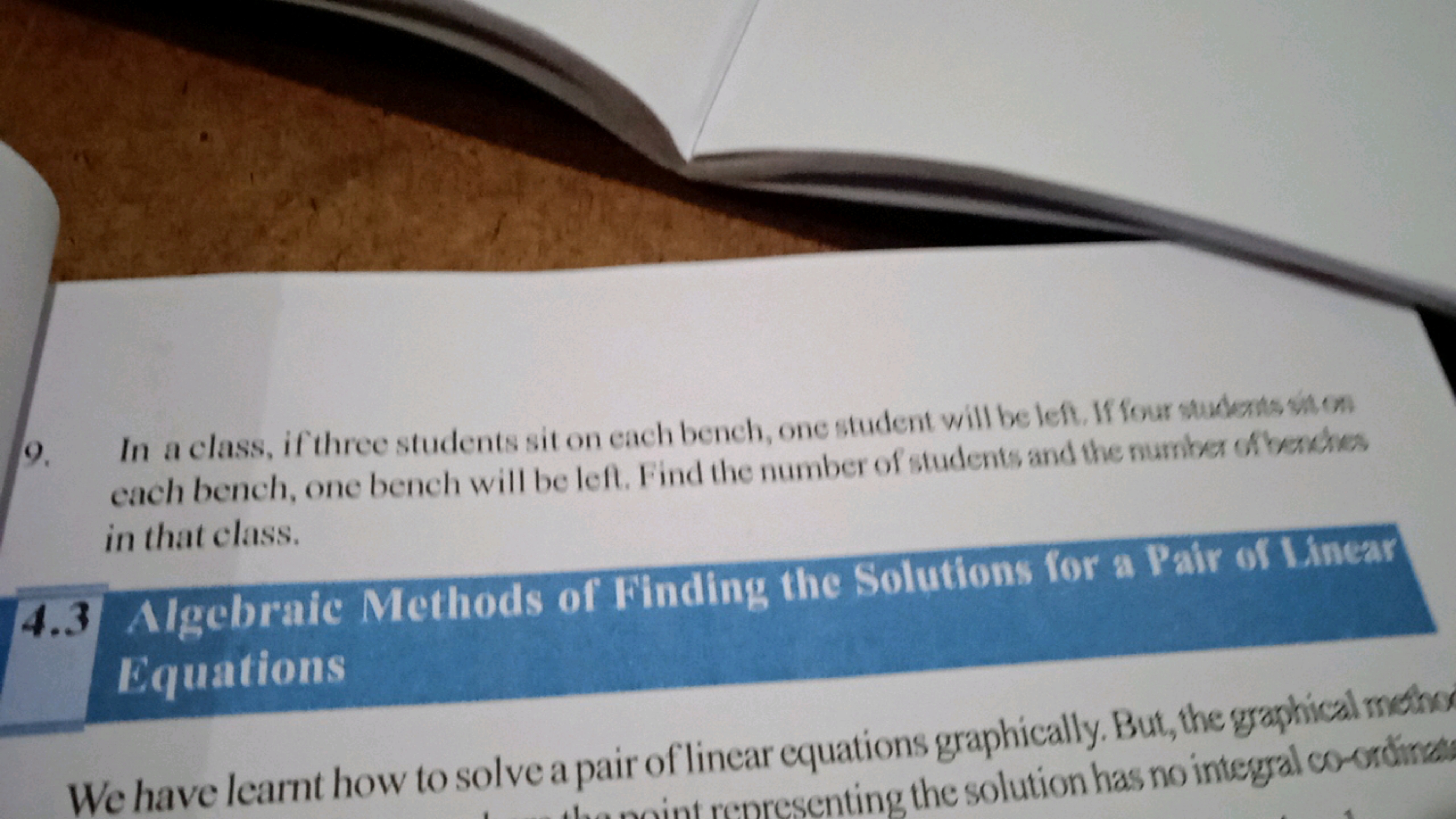 9. In a class, if three students sit on each bench, one student will b