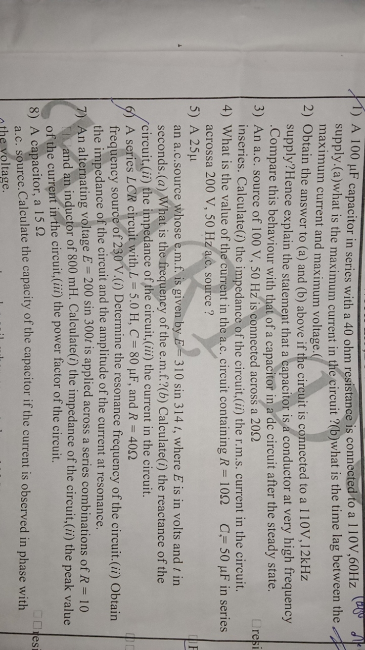 1) A 100μF capacitor in series with a 40 ohm resistance is connected t