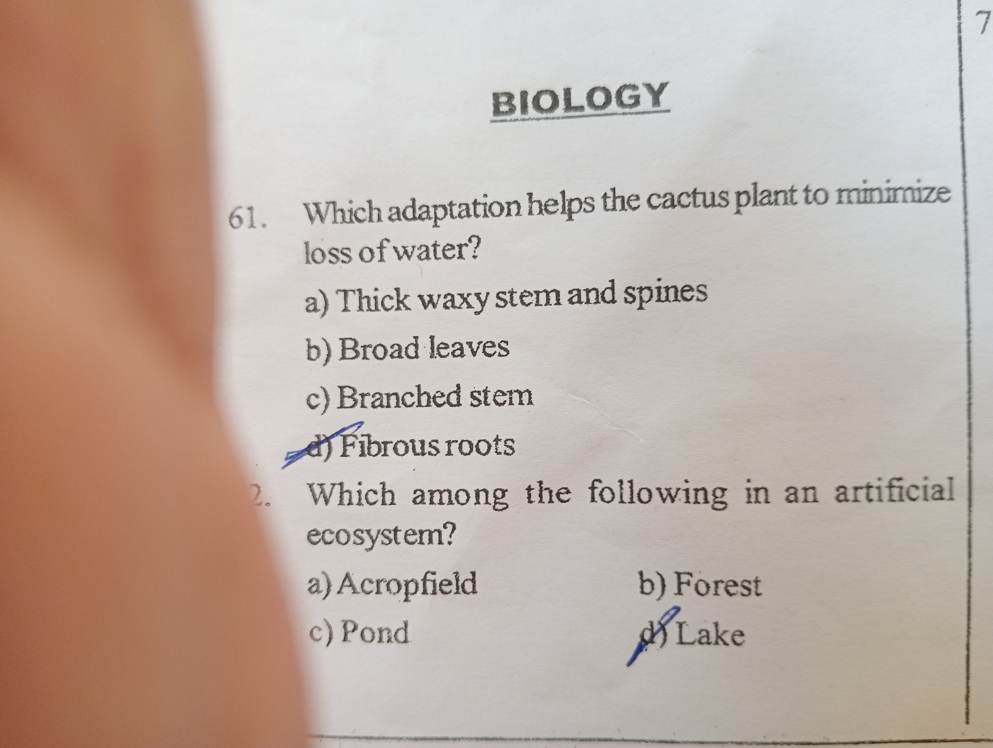 BIOLOGY
61. Which adaptation helps the cactus plant to minimize loss o