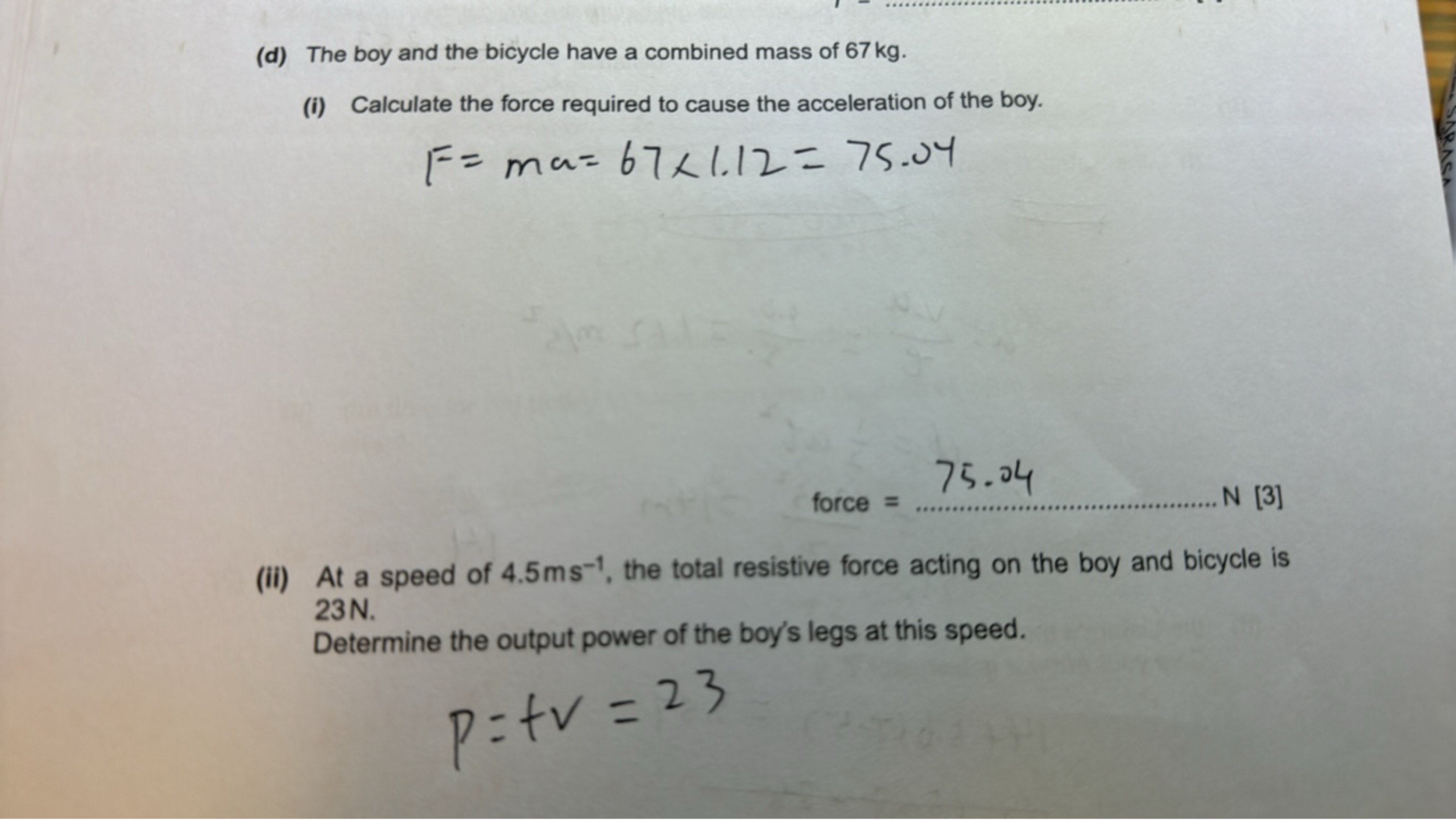 (d) The boy and the bicycle have a combined mass of 67 kg .
(i) Calcul