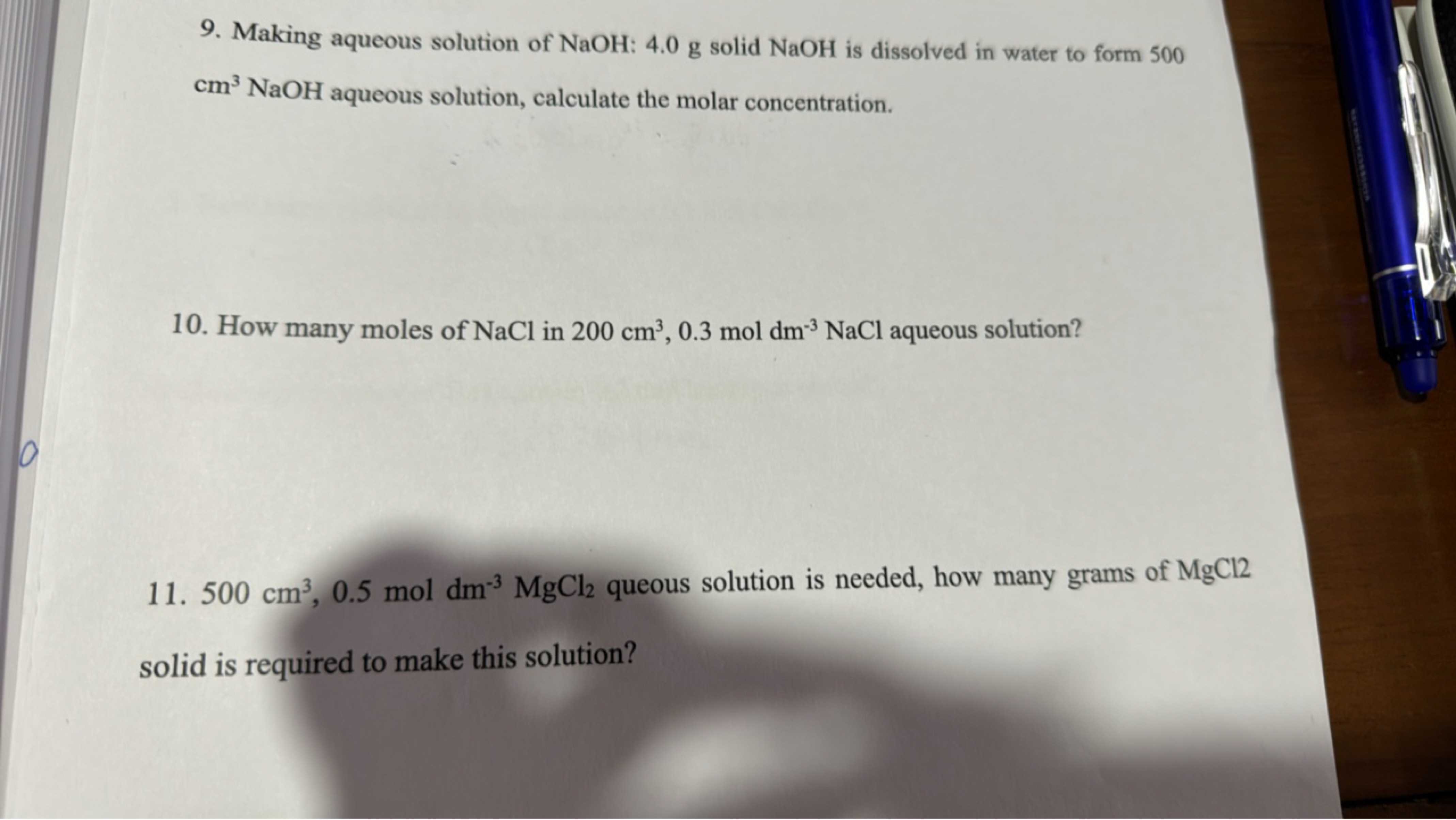 9. Making aqueous solution of NaOH:4.0 g solid NaOH is dissolved in wa