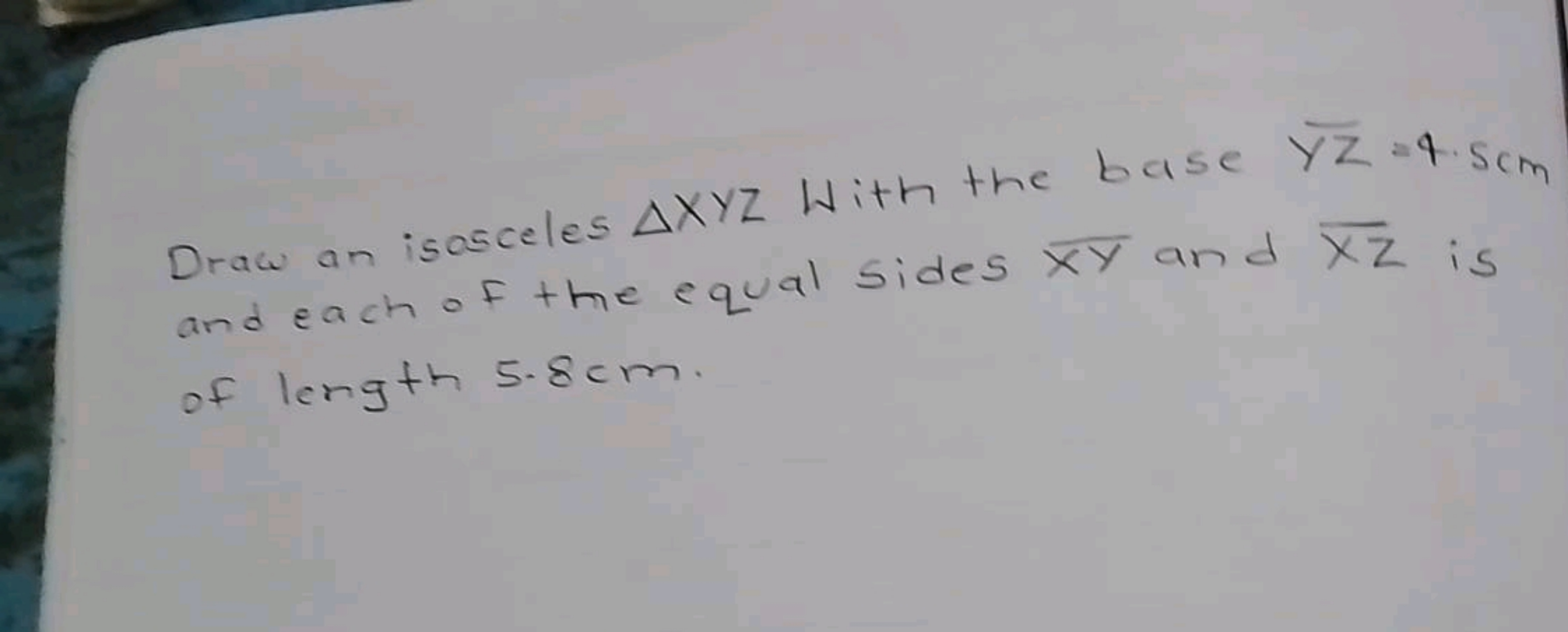 Draw an isosceles △XYZ With the base yZ​=4.5 cm and each of the equal 