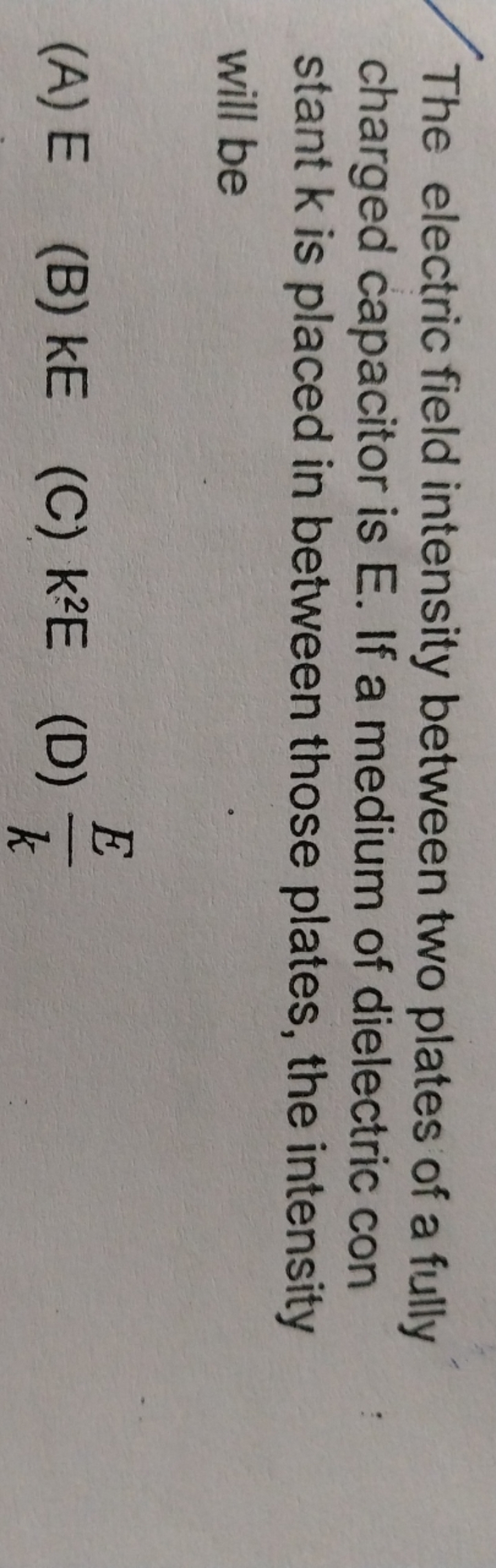 The electric field intensity between two plates of a fully charged cap