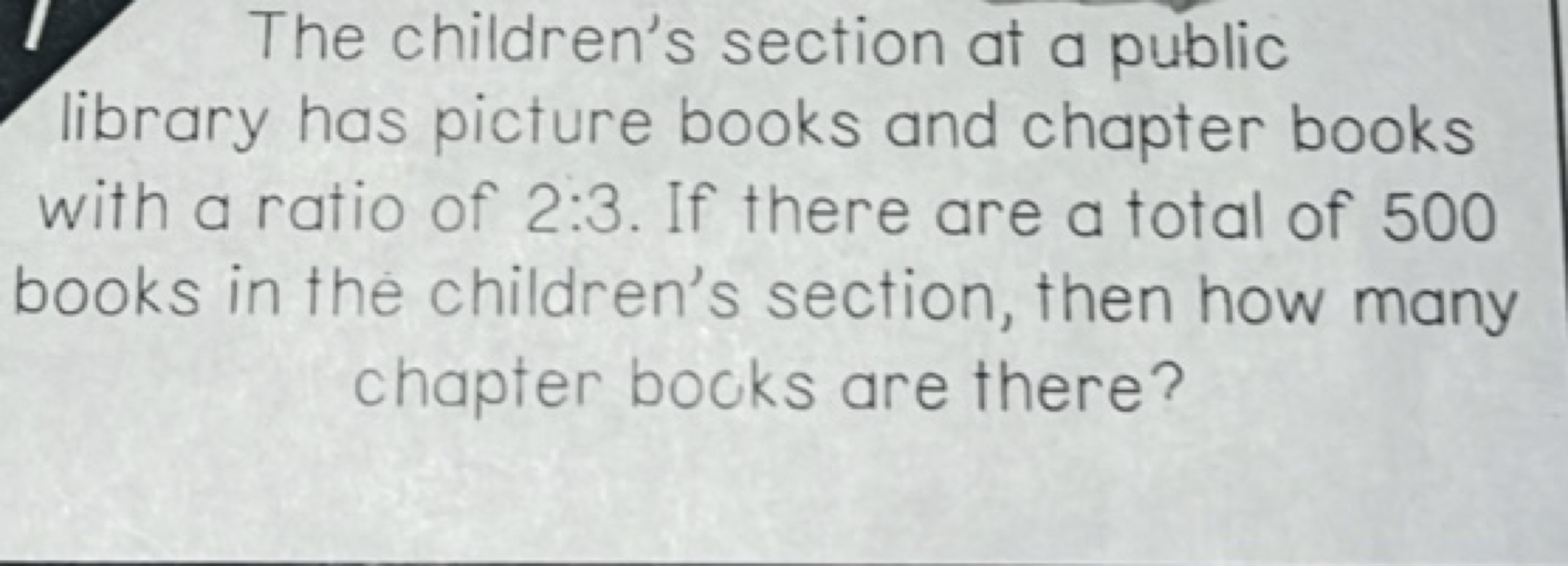 1 The children's section at a public library has picture books and cha