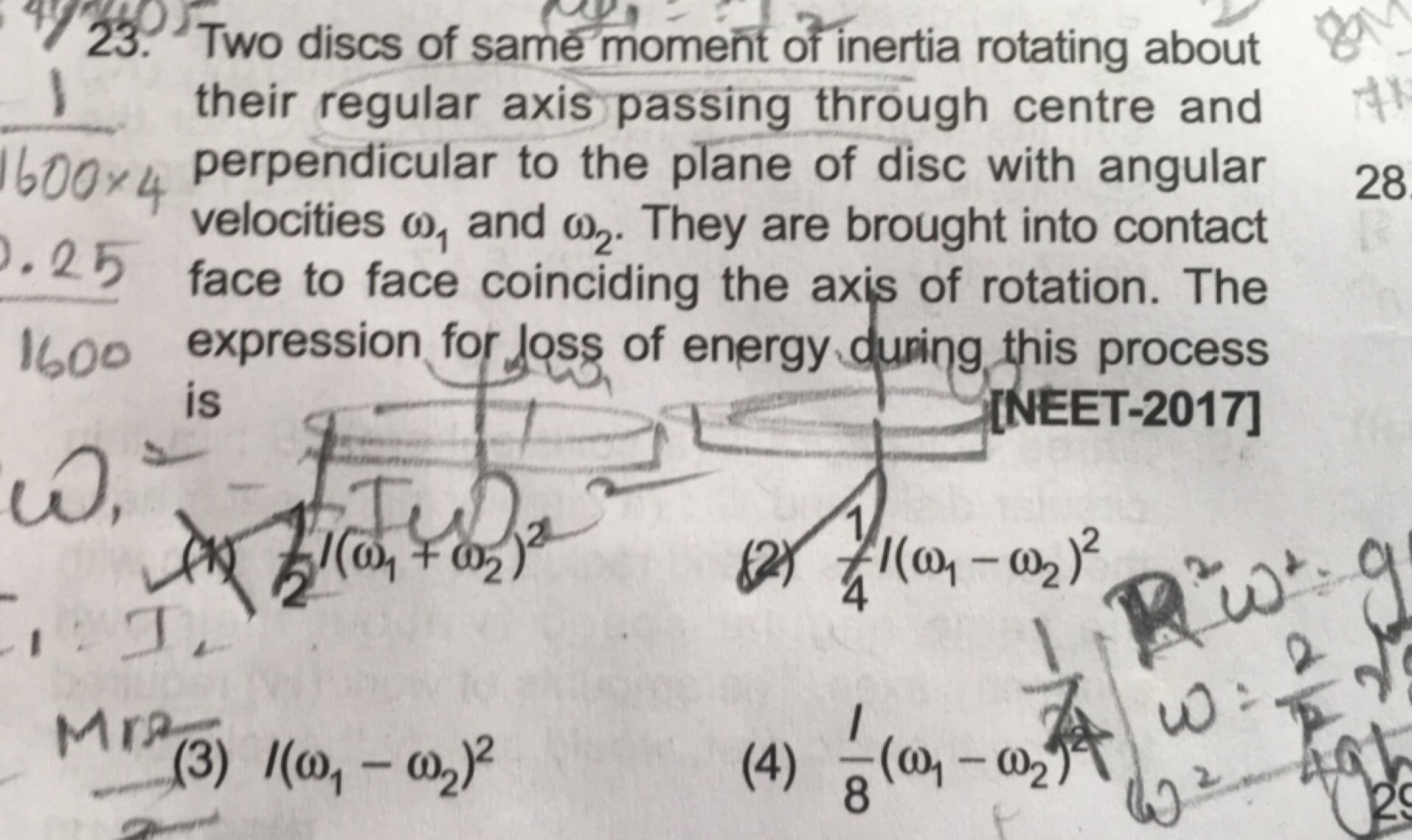 23. Two discs of same moment of inertia rotating about  their regular 