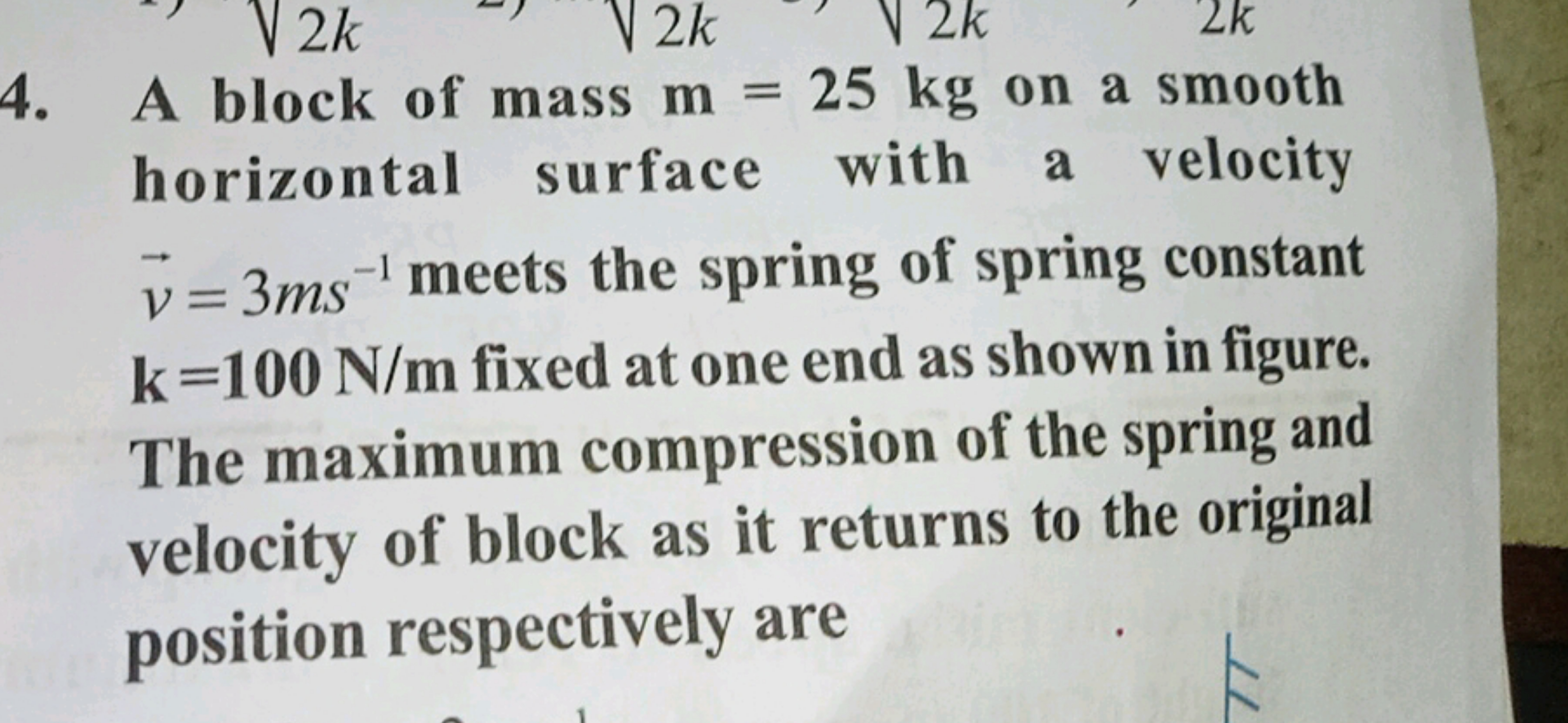 4. A block of mass m=25 kg on a smooth horizontal surface with a veloc