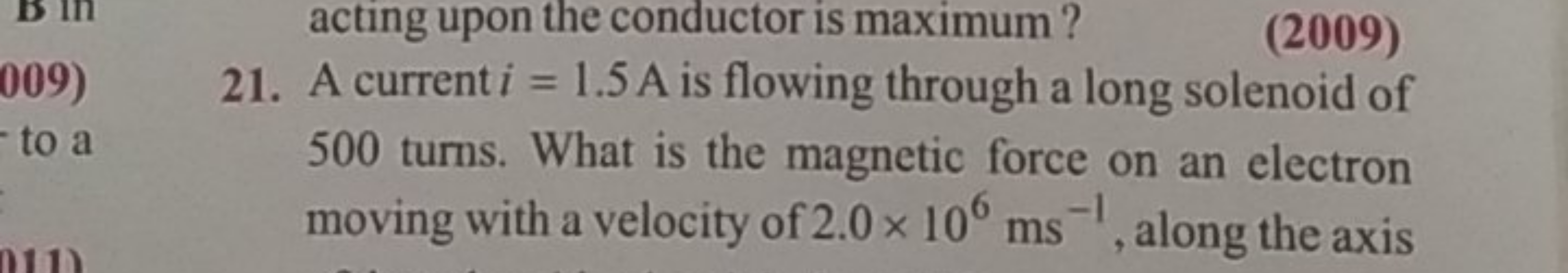 21. A current i=1.5 A is flowing through a long solenoid of 500 turns.