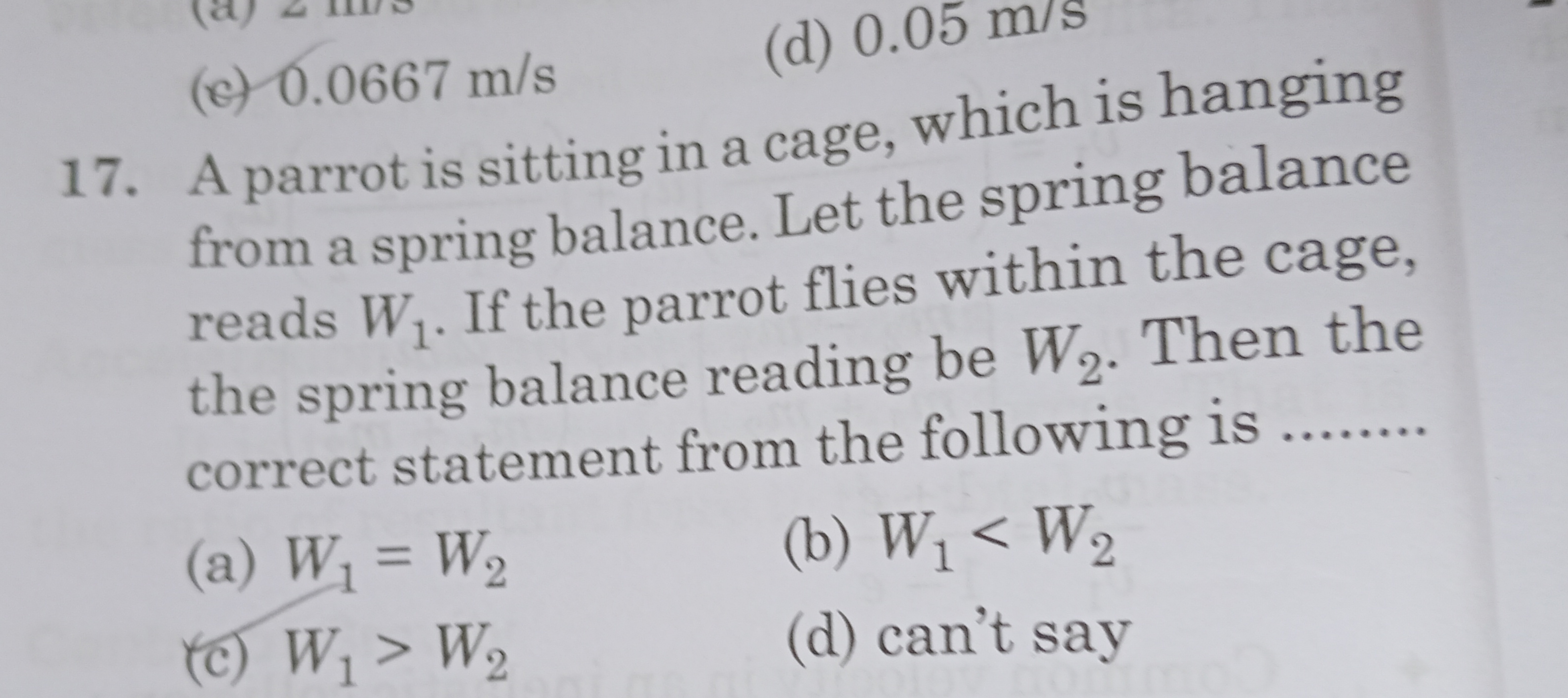 (c) 0.0667 m/s
(d) 0.05 m/s
17. A parrot is sitting in a cage, which i