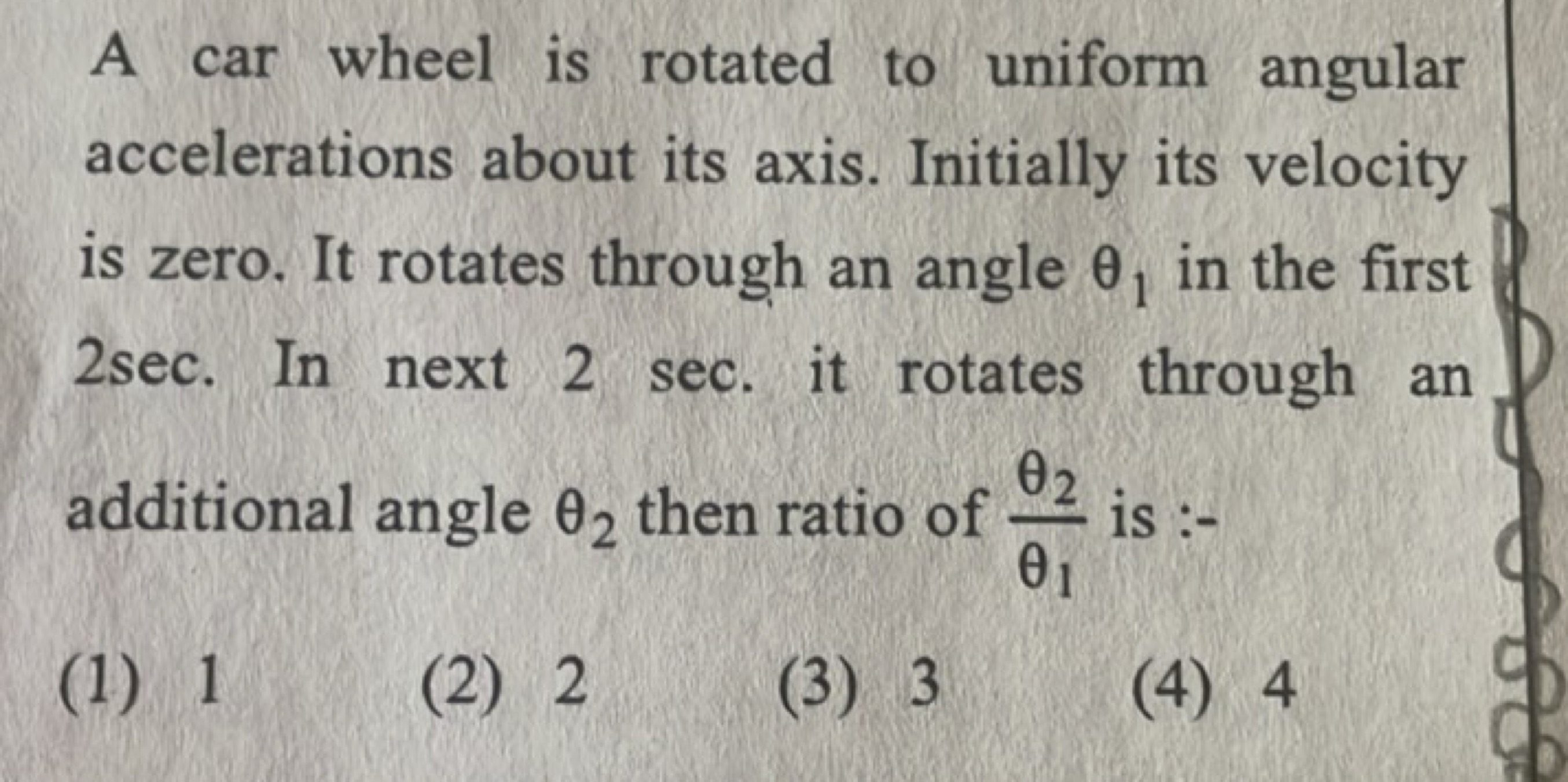 A car wheel is rotated to uniform angular accelerations about its axis