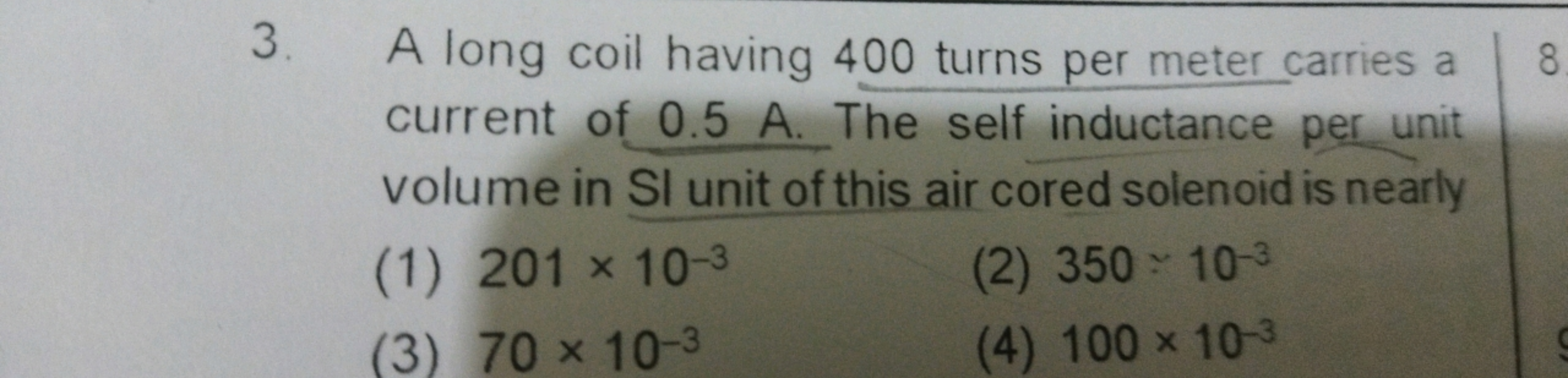 3. A long coil having 400 turns per meter carries a current of 0.5 A .