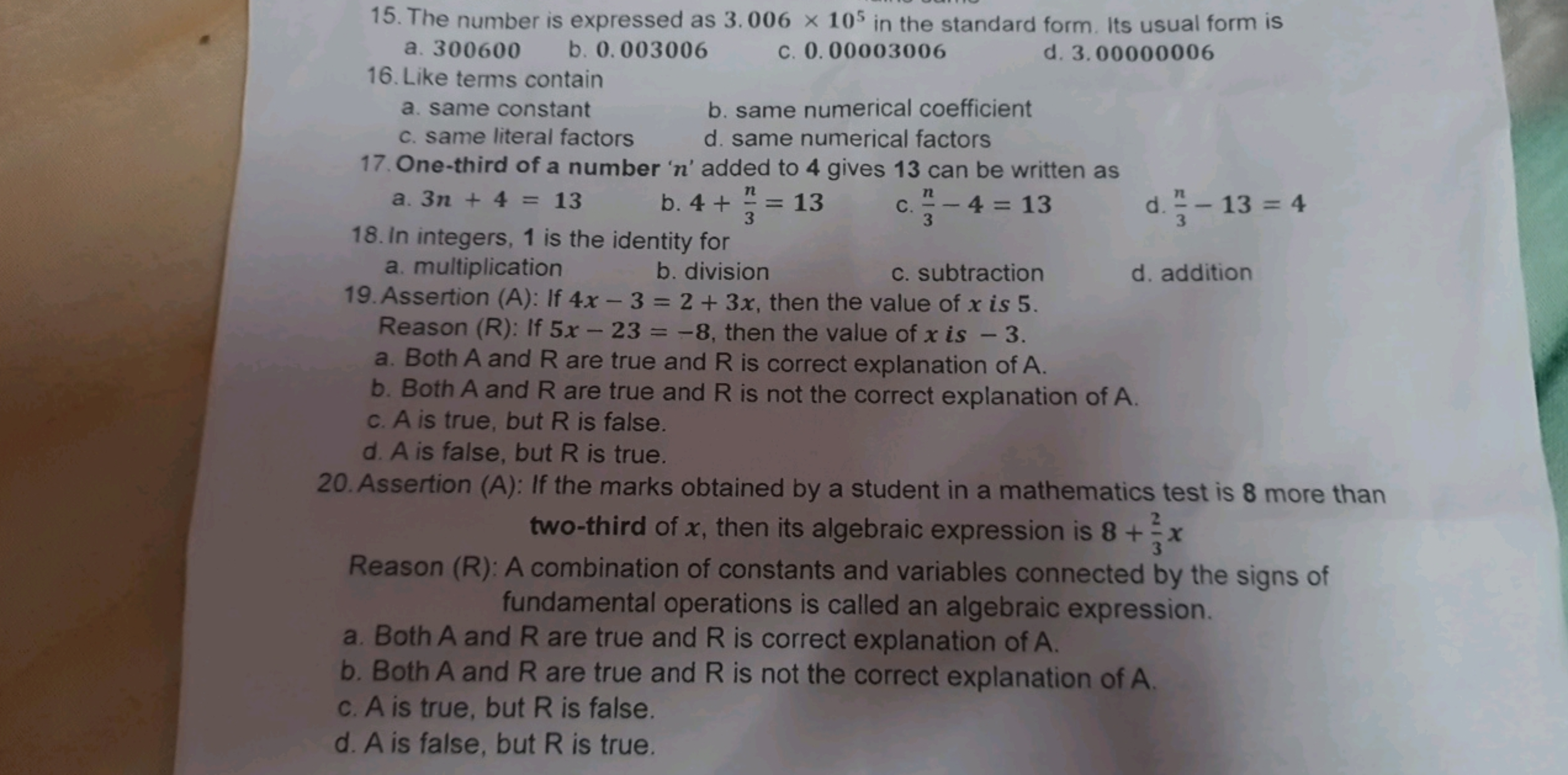 15. The number is expressed as 3.006×105 in the standard form. Its usu