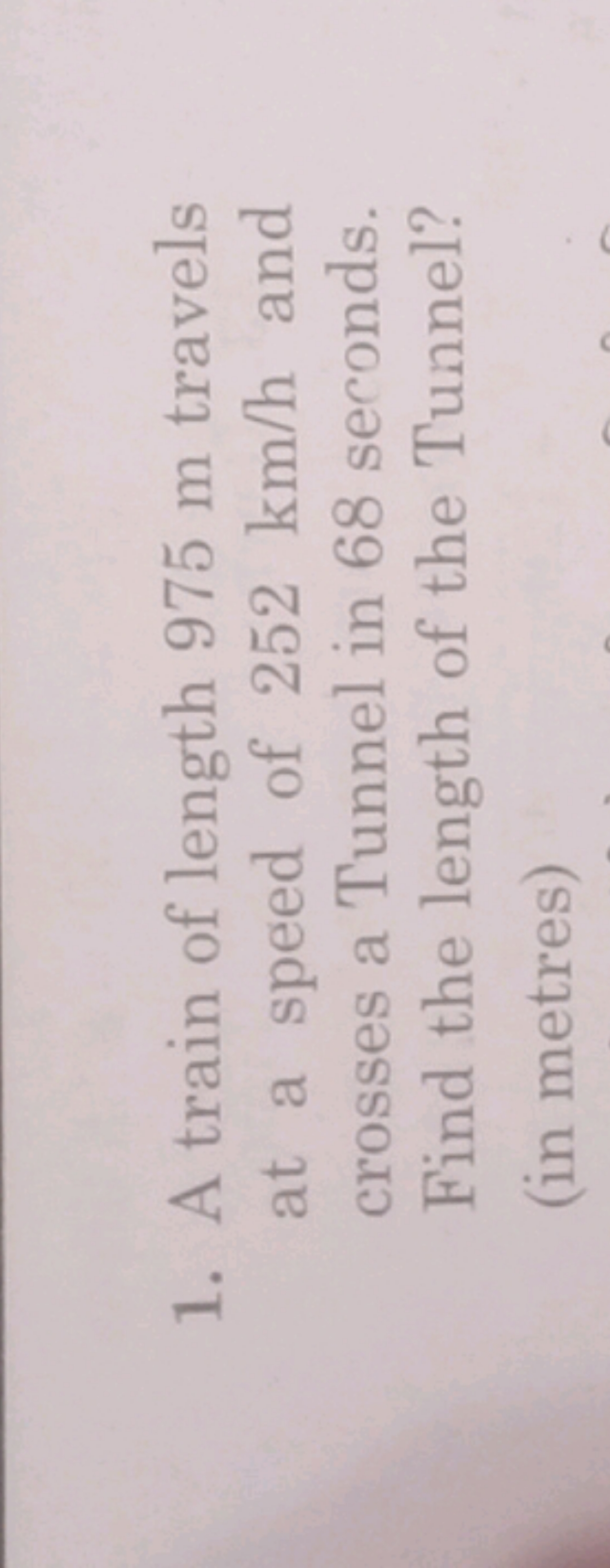 1. A train of length 975 m travels at a speed of 252 km/h and crosses 