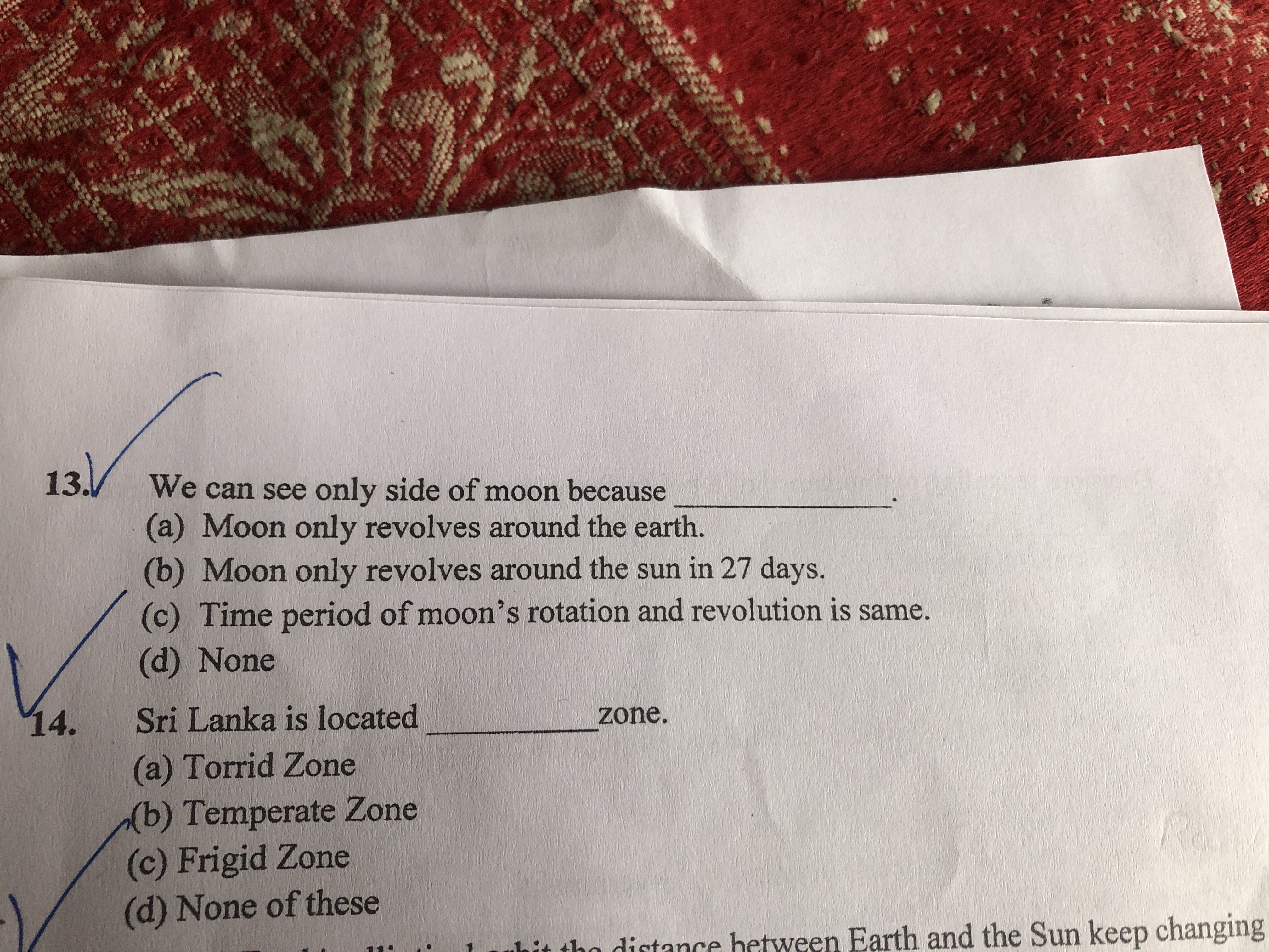 13. We can see only side of moon because 
(a) Moon only revolves aroun