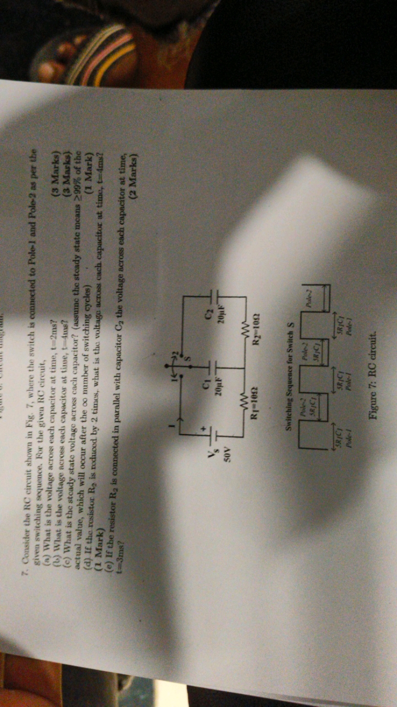 7. Consider the RC circuit shown in Fig. 7, where the switch is connec