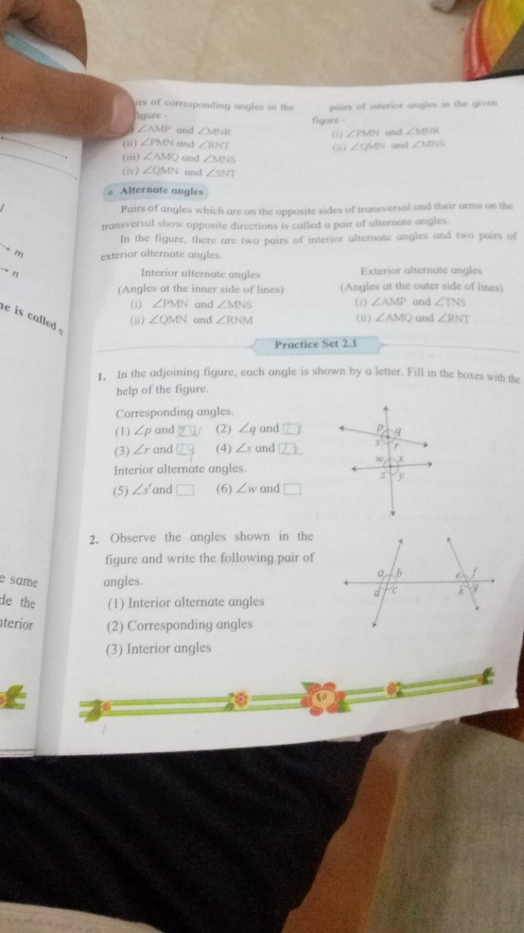 irs of corresponding angles in the igure -
AAN" and ∠MMM
(ii) ∠PMN and