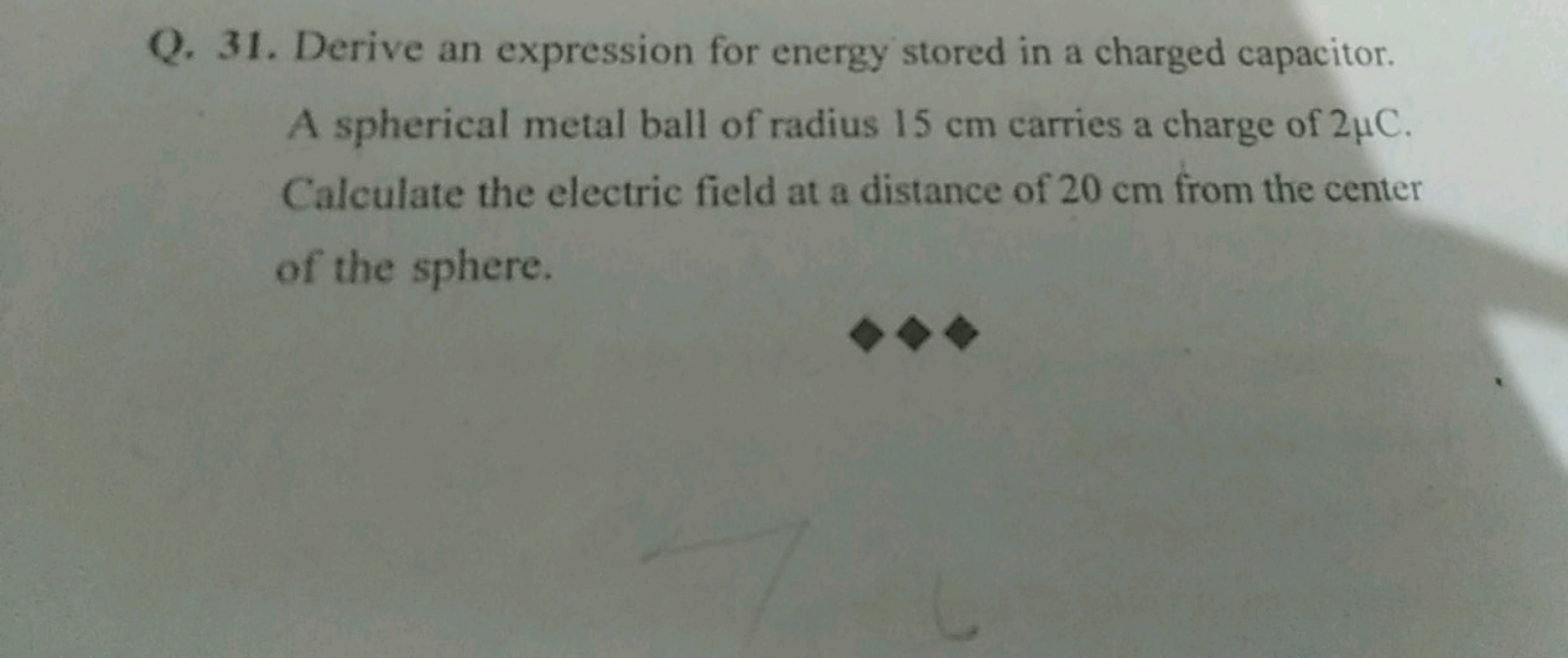 Q. 31. Derive an expression for energy stored in a charged capacitor.
