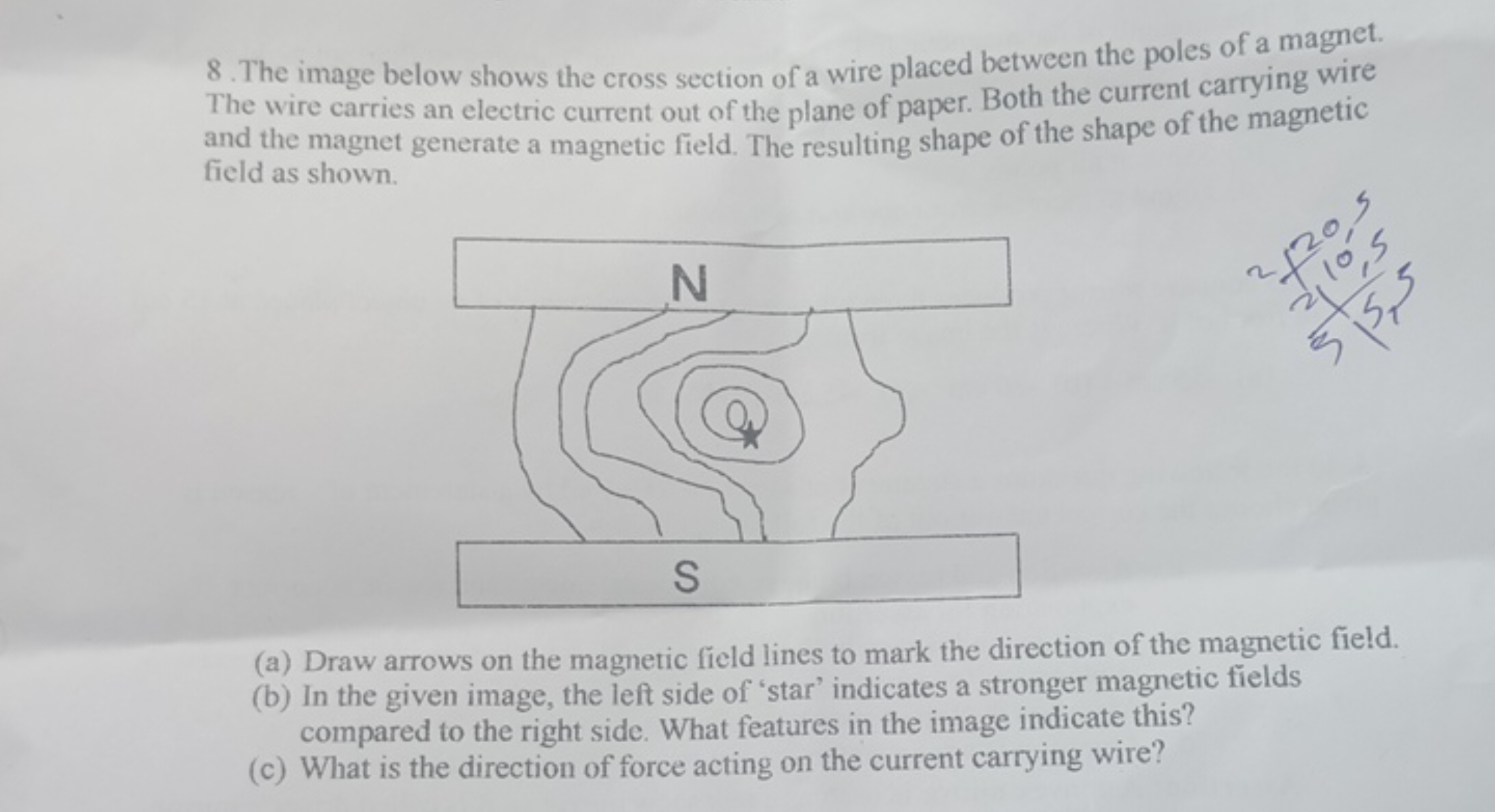 8. The image below shows the cross section of a wire placed between th