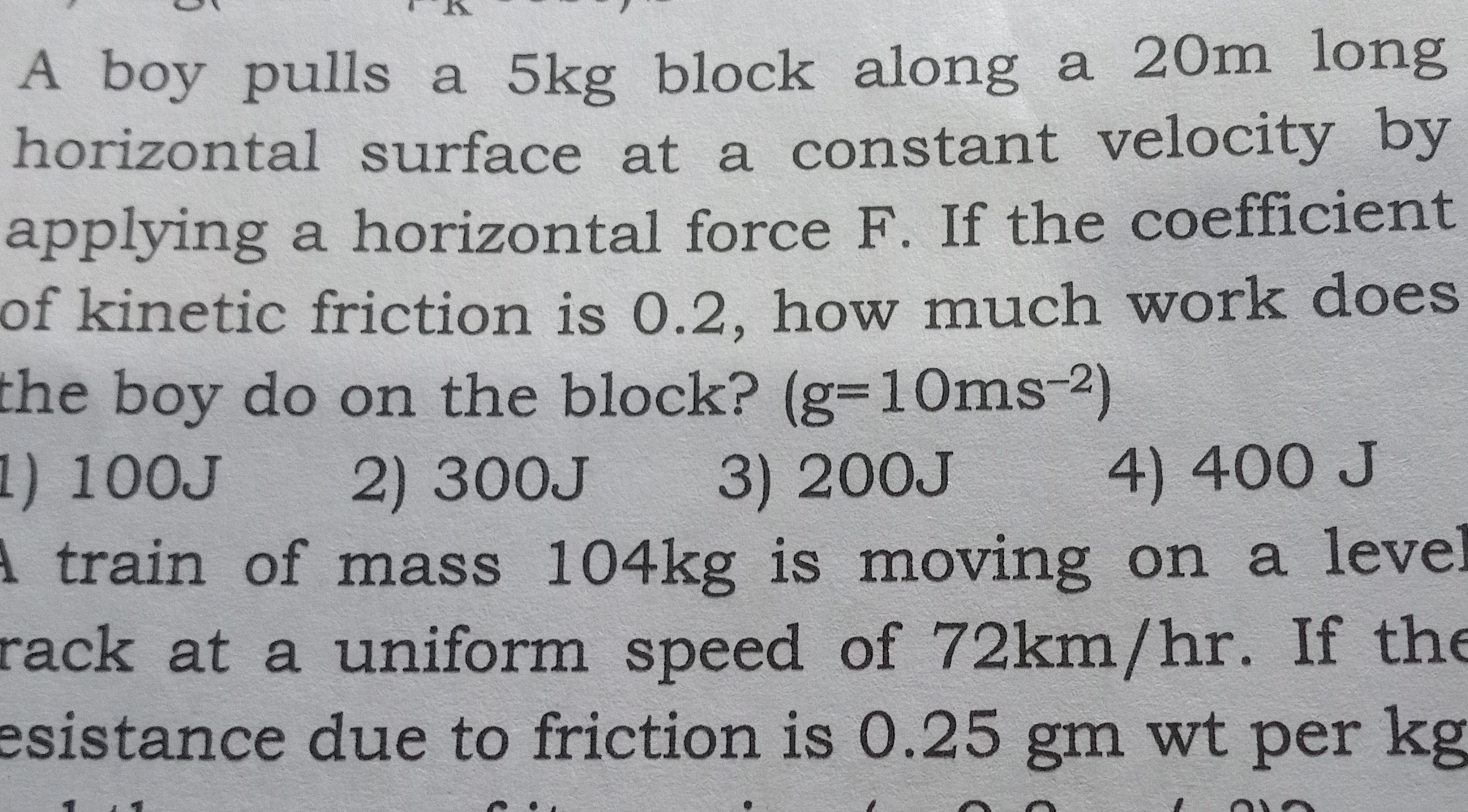 A boy pulls a 5kg block along a 20m long
horizontal surface at a const