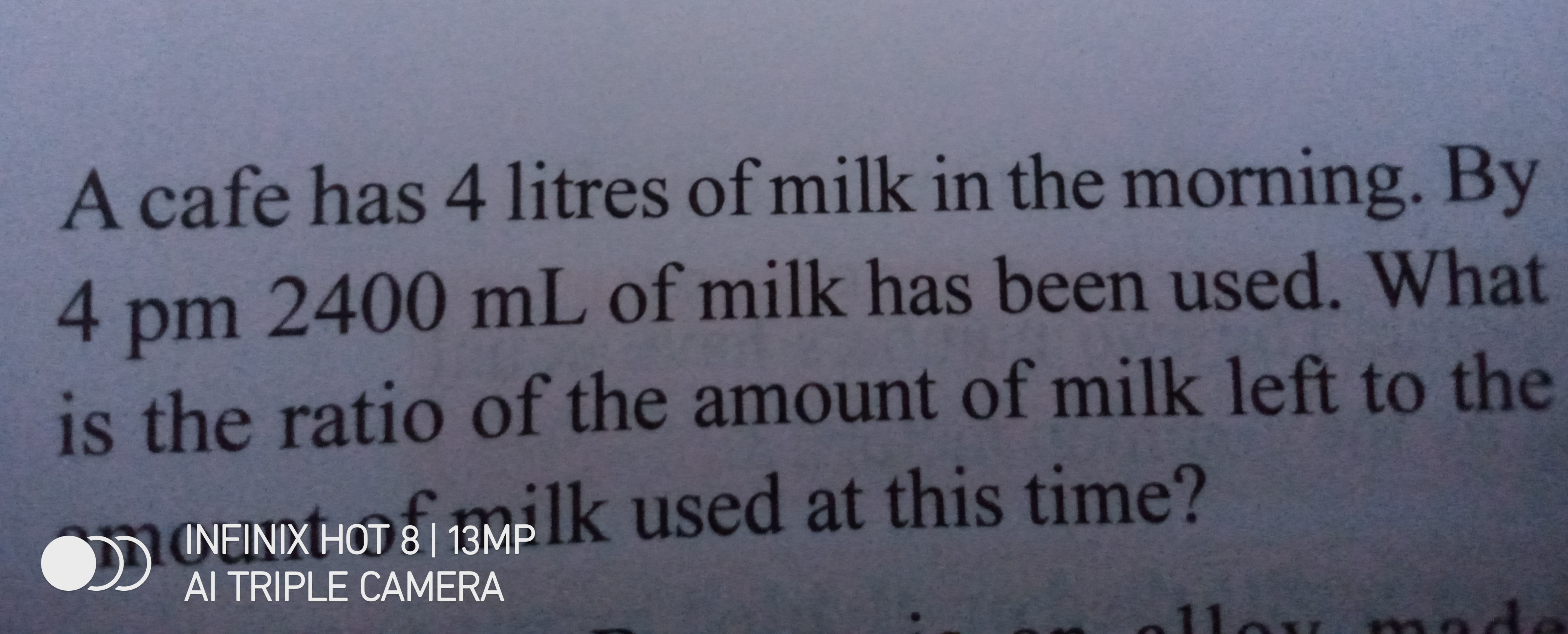 A cafe has 4 litres of milk in the morning. By 4 pm 2400 mL of milk ha