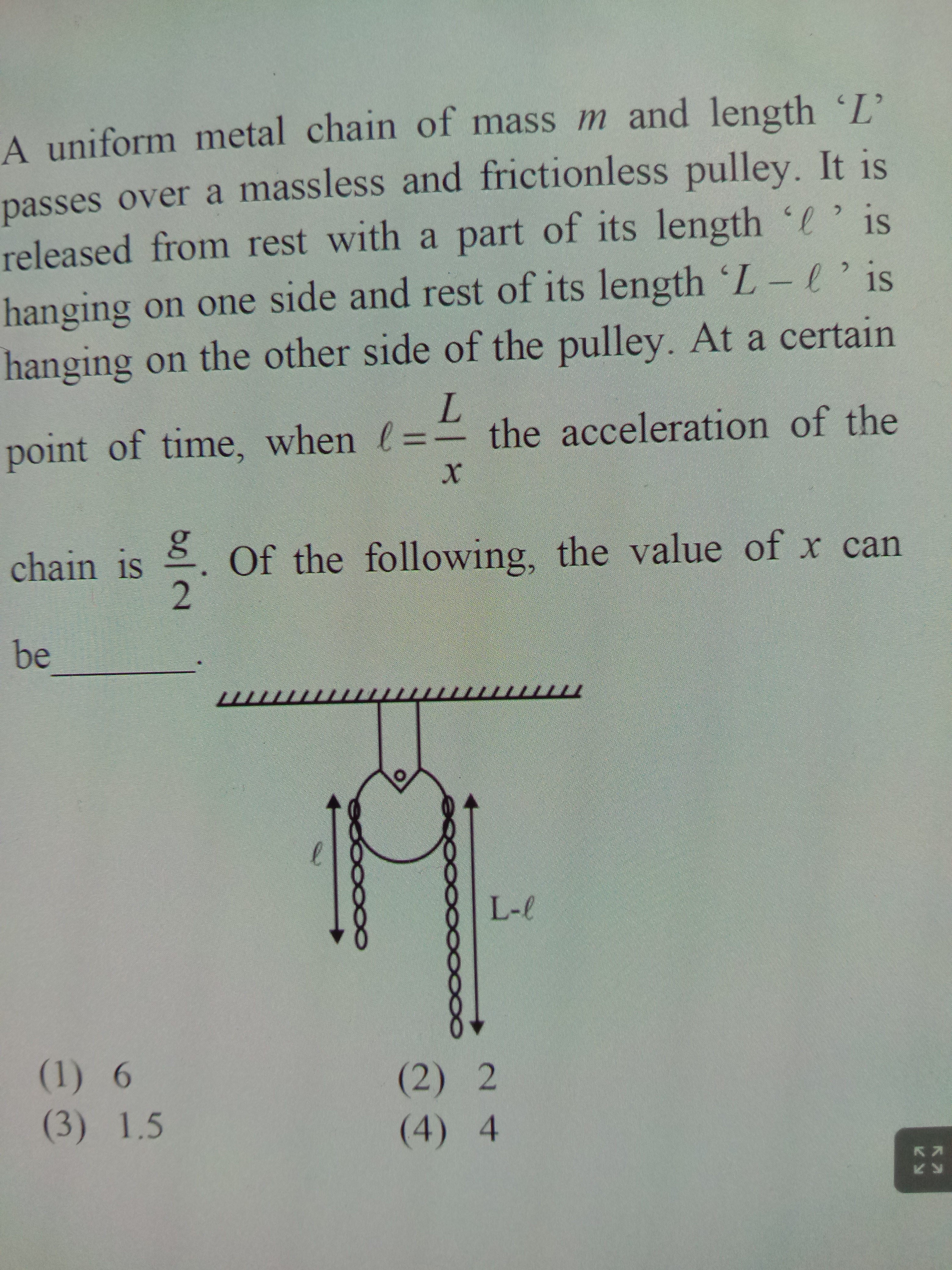 A uniform metal chain of mass m and length 'L'
passes over a massless 